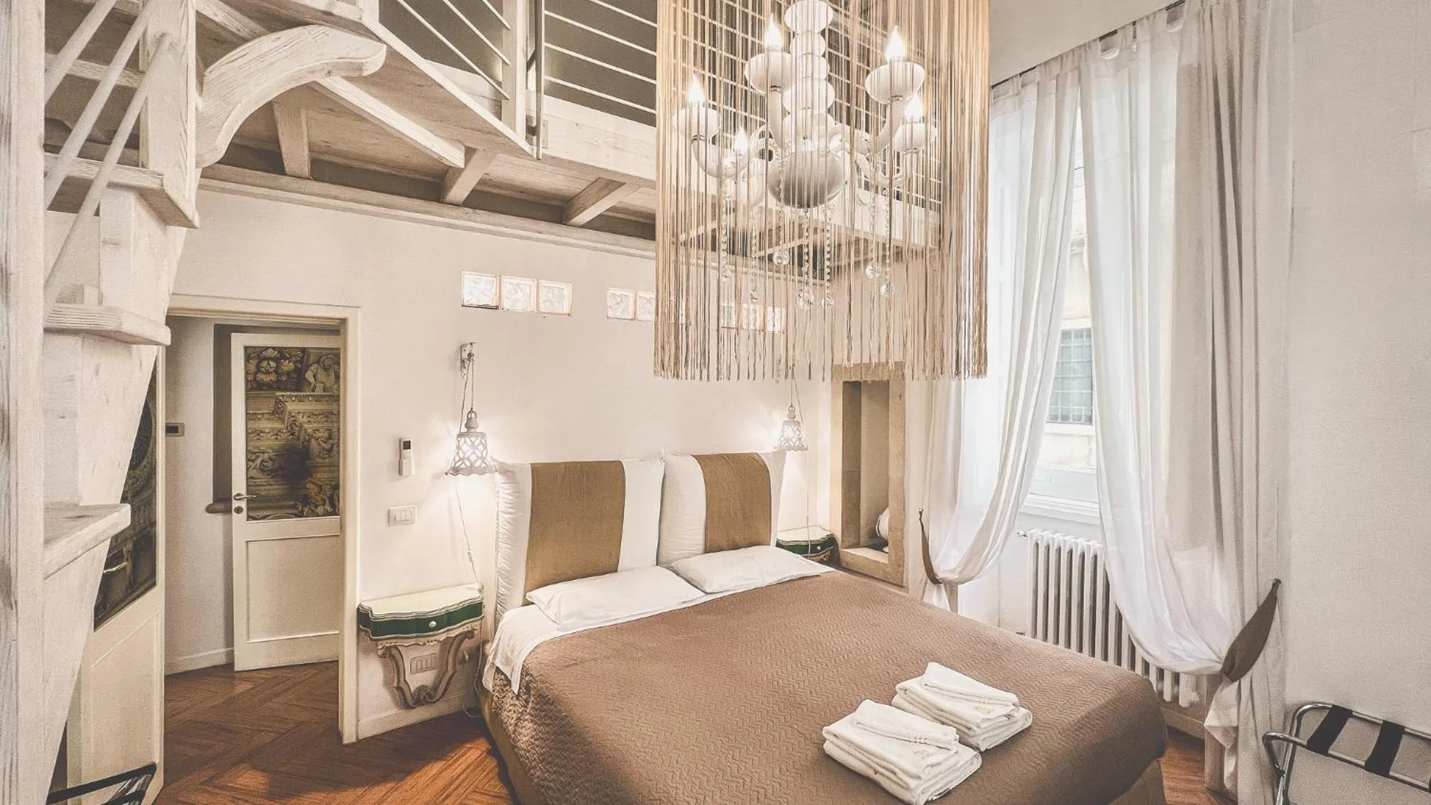 Bed in Cadelli Luxury Suite & Apartments