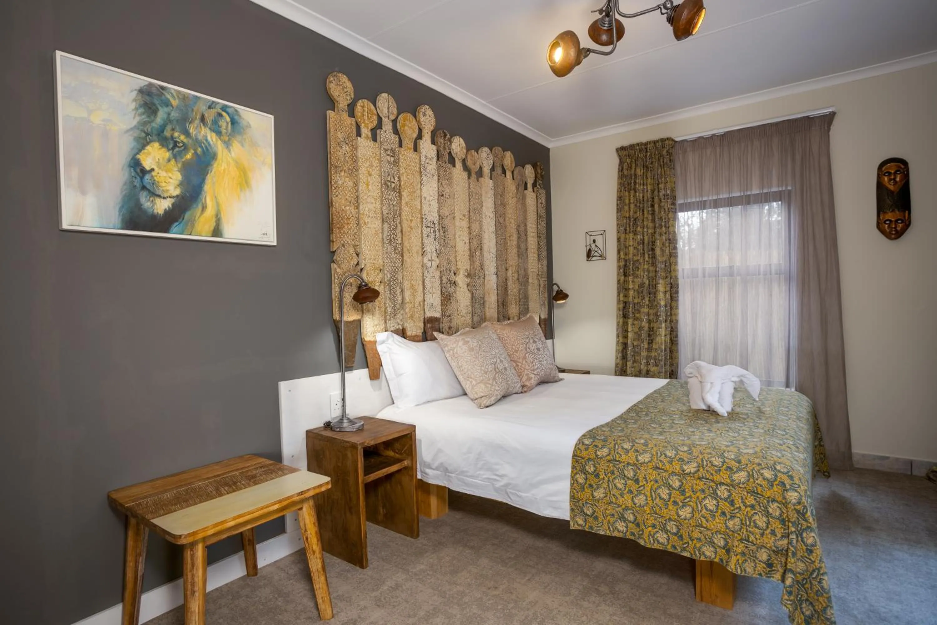 Bed in African Rock Hotel & Spa, a "Boutique Lifestyle Resort"