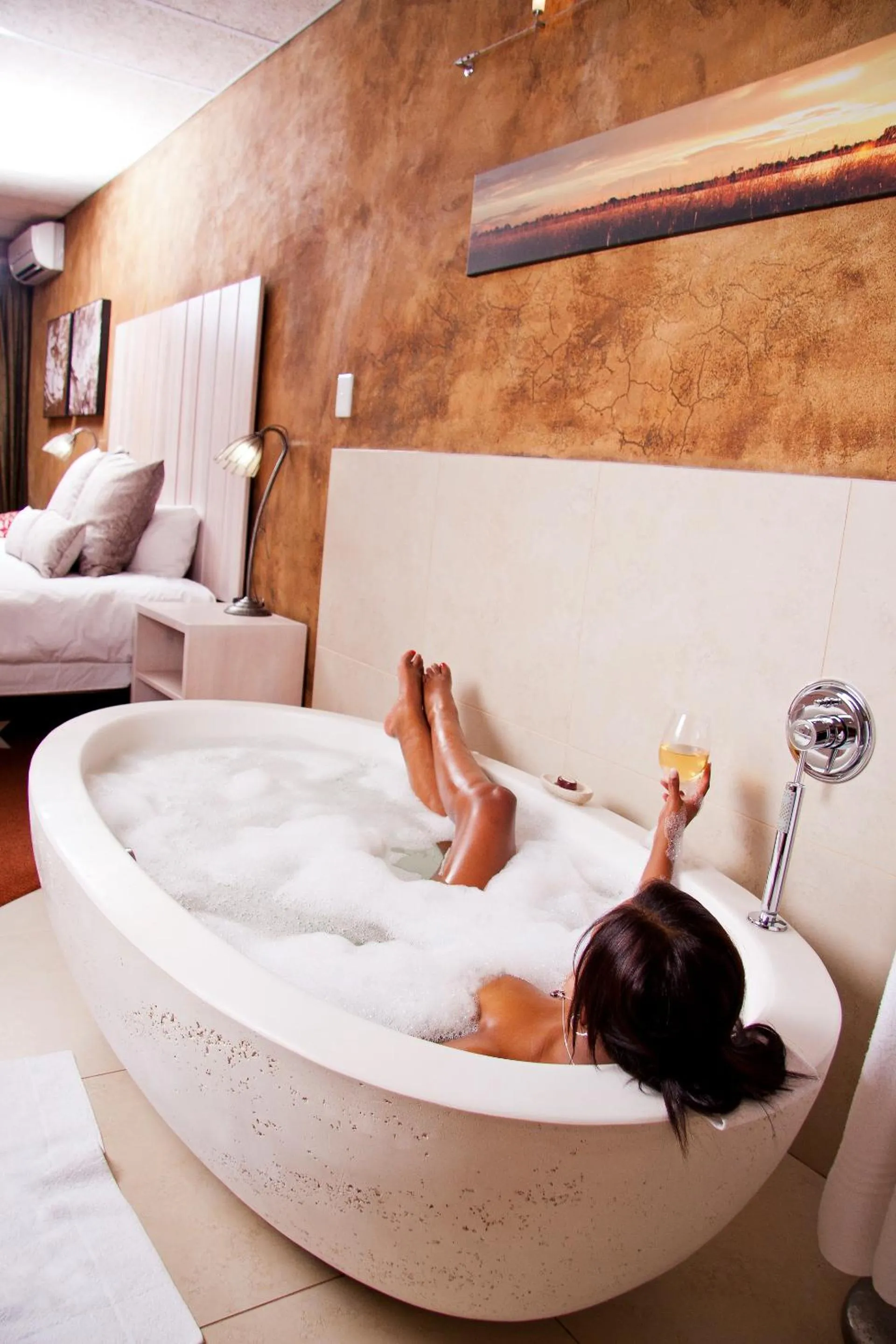Bathroom, Bed in African Rock Hotel & Spa, a "Boutique Lifestyle Resort"
