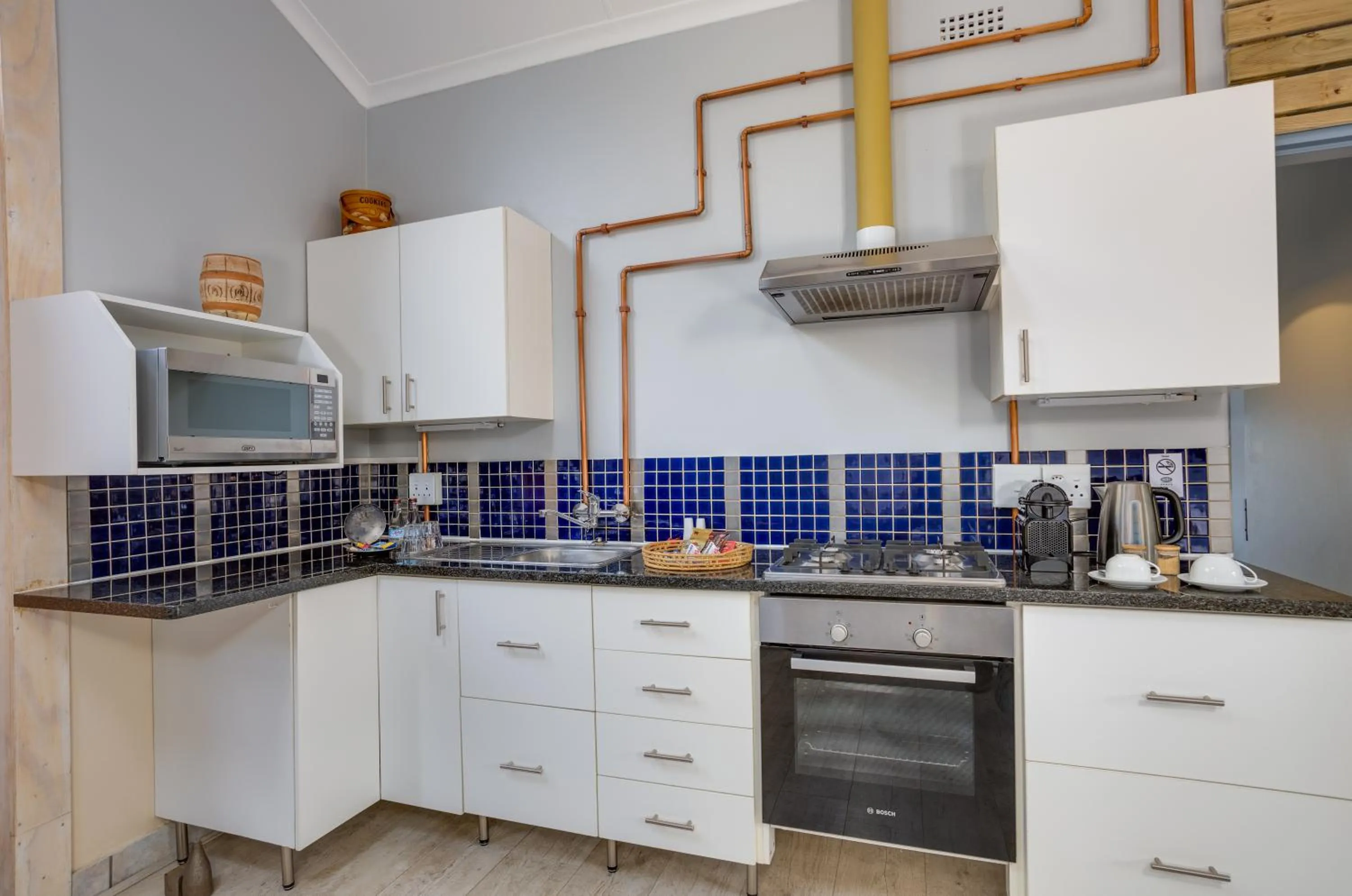 Kitchen or kitchenette in African Rock Hotel & Spa, a "Boutique Lifestyle Resort"