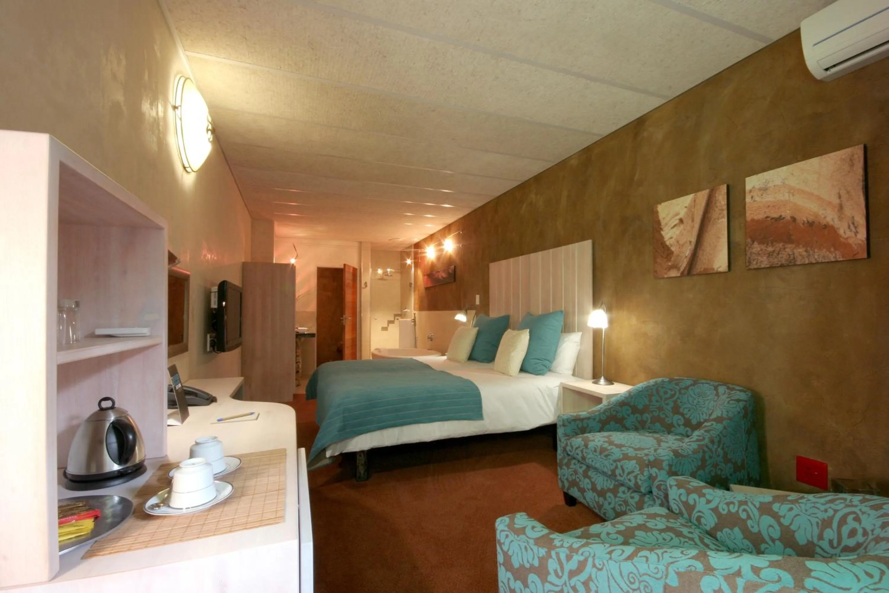 Bed in African Rock Hotel & Spa, a "Boutique Lifestyle Resort"