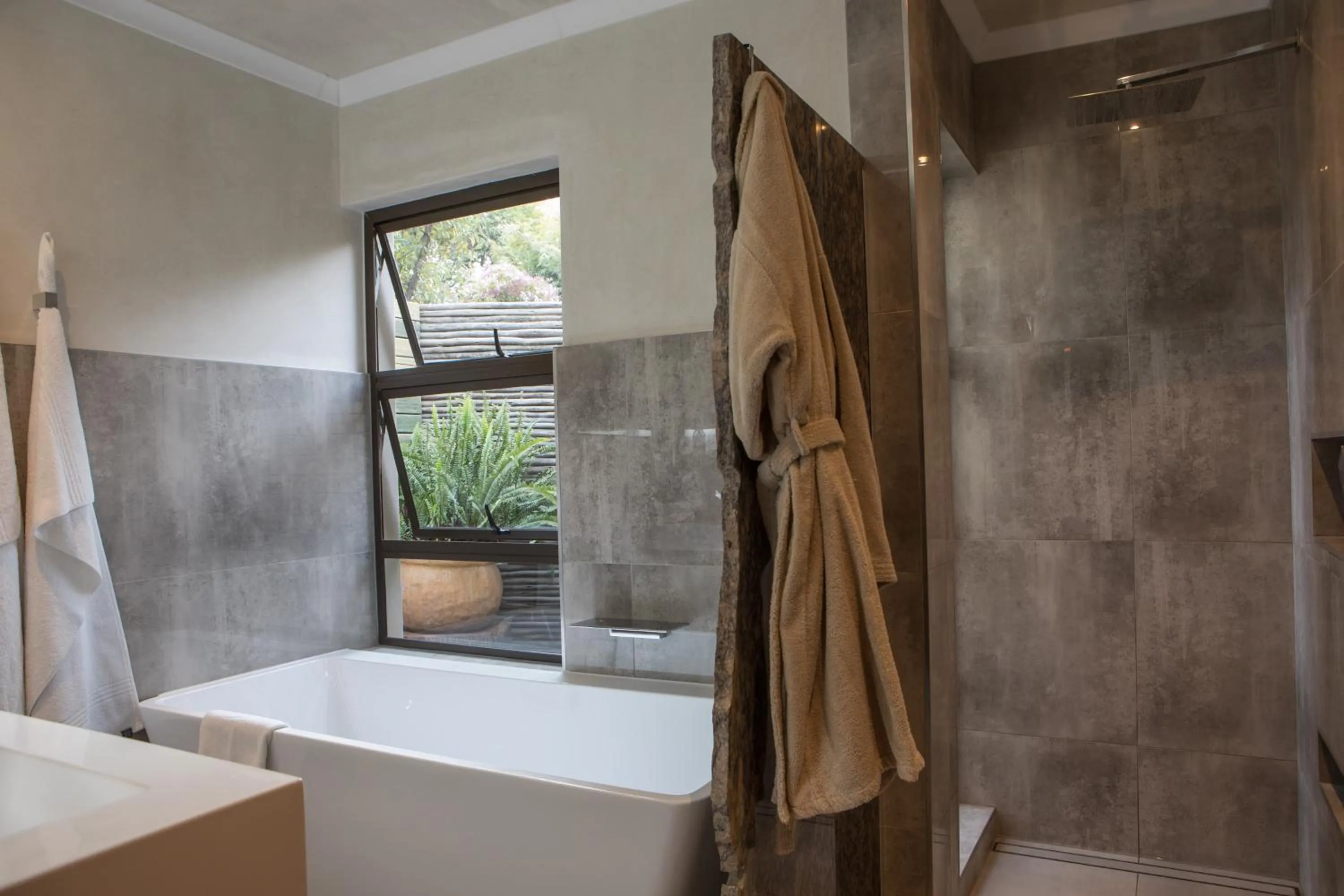 Bathroom, Bed in African Rock Hotel & Spa, a "Boutique Lifestyle Resort"
