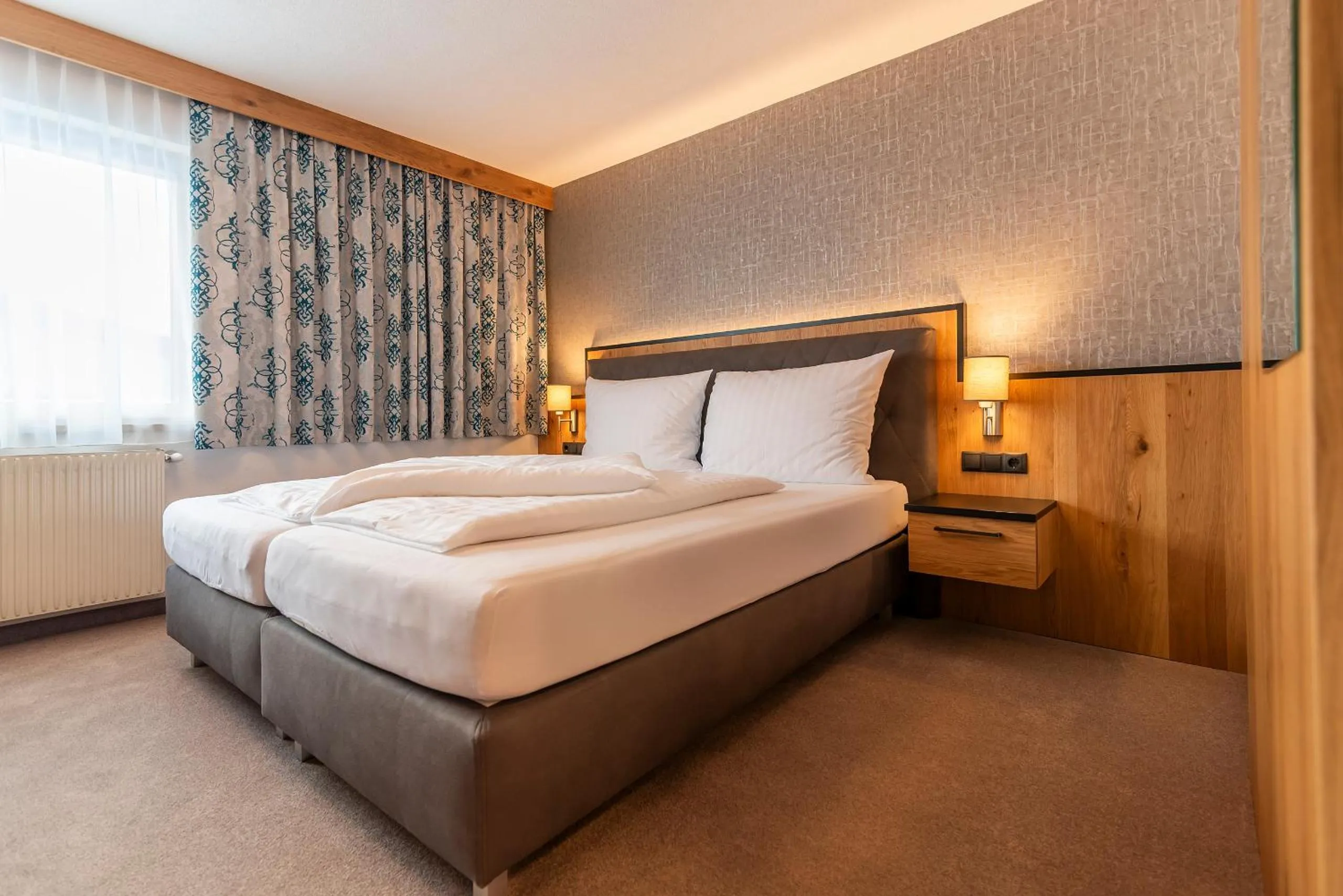 Bed in Hotel Garni Försterheim