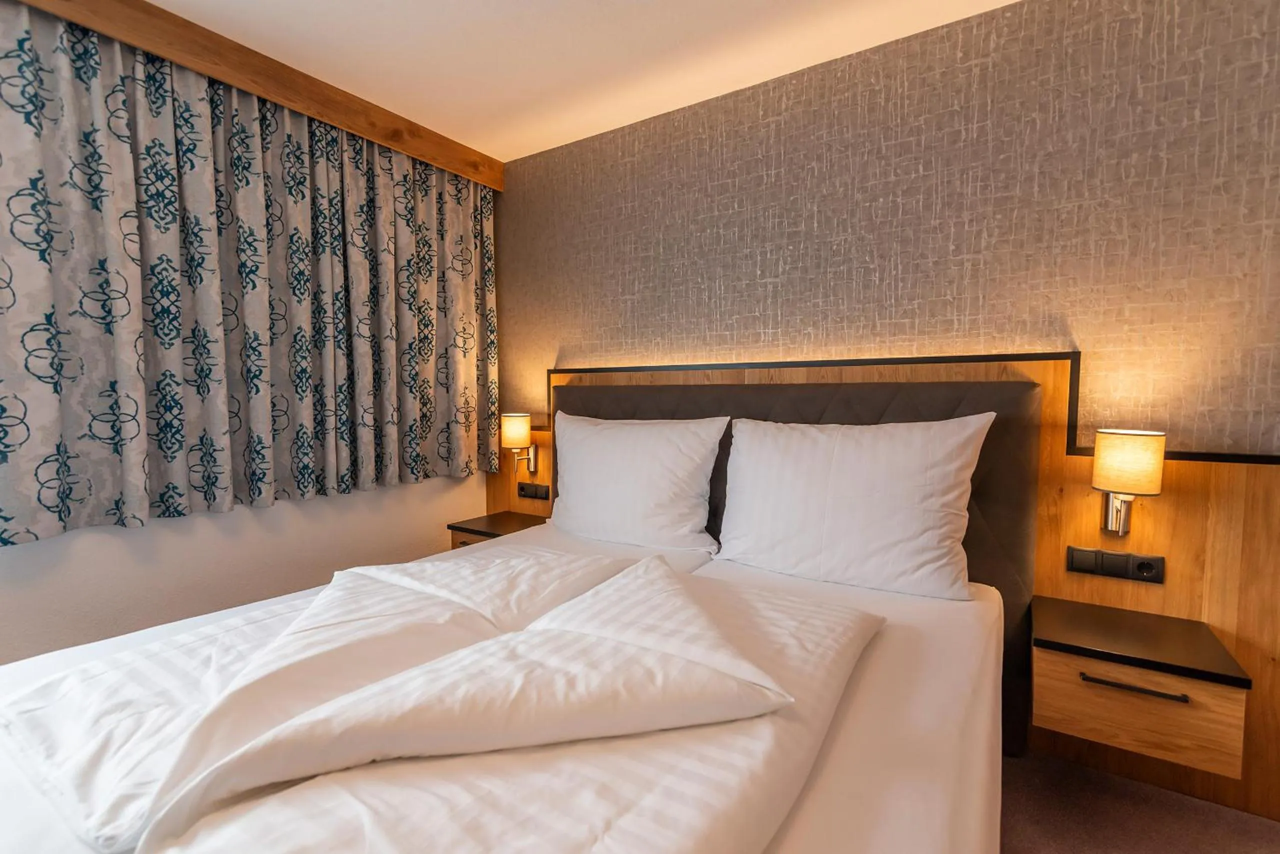 Bed in Hotel Garni Försterheim