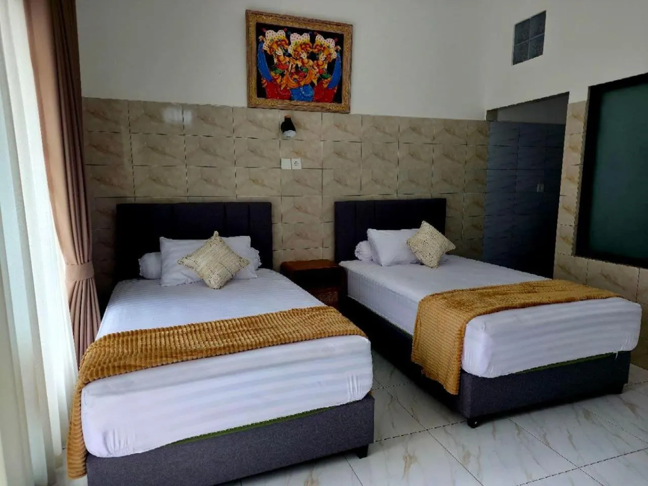 Bed in Kerti Beach Bungalow and Restaurant