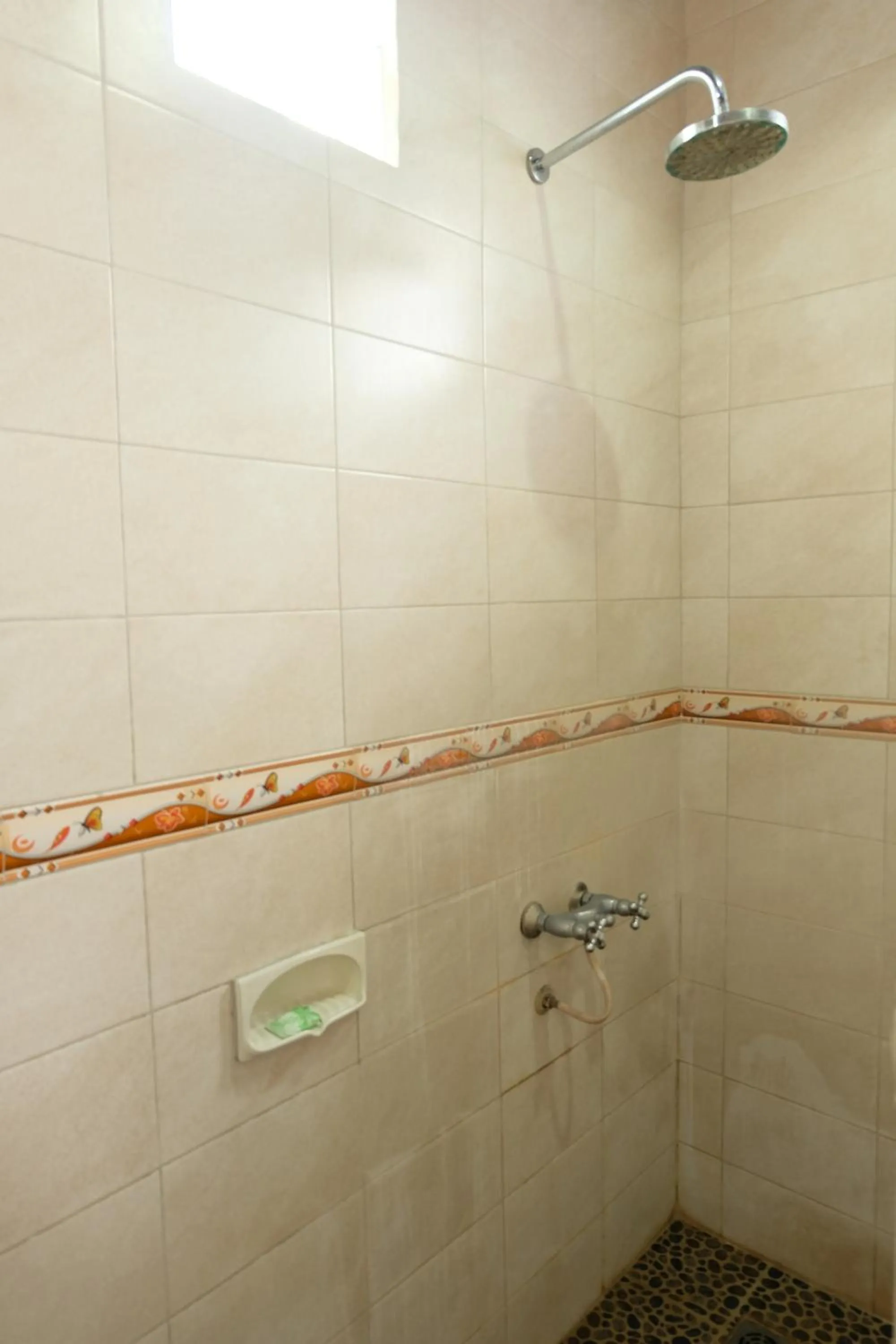 Bathroom in Kerti Beach Bungalow and Restaurant