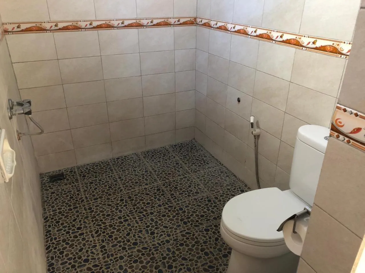 Bathroom in Kerti Beach Bungalow and Restaurant