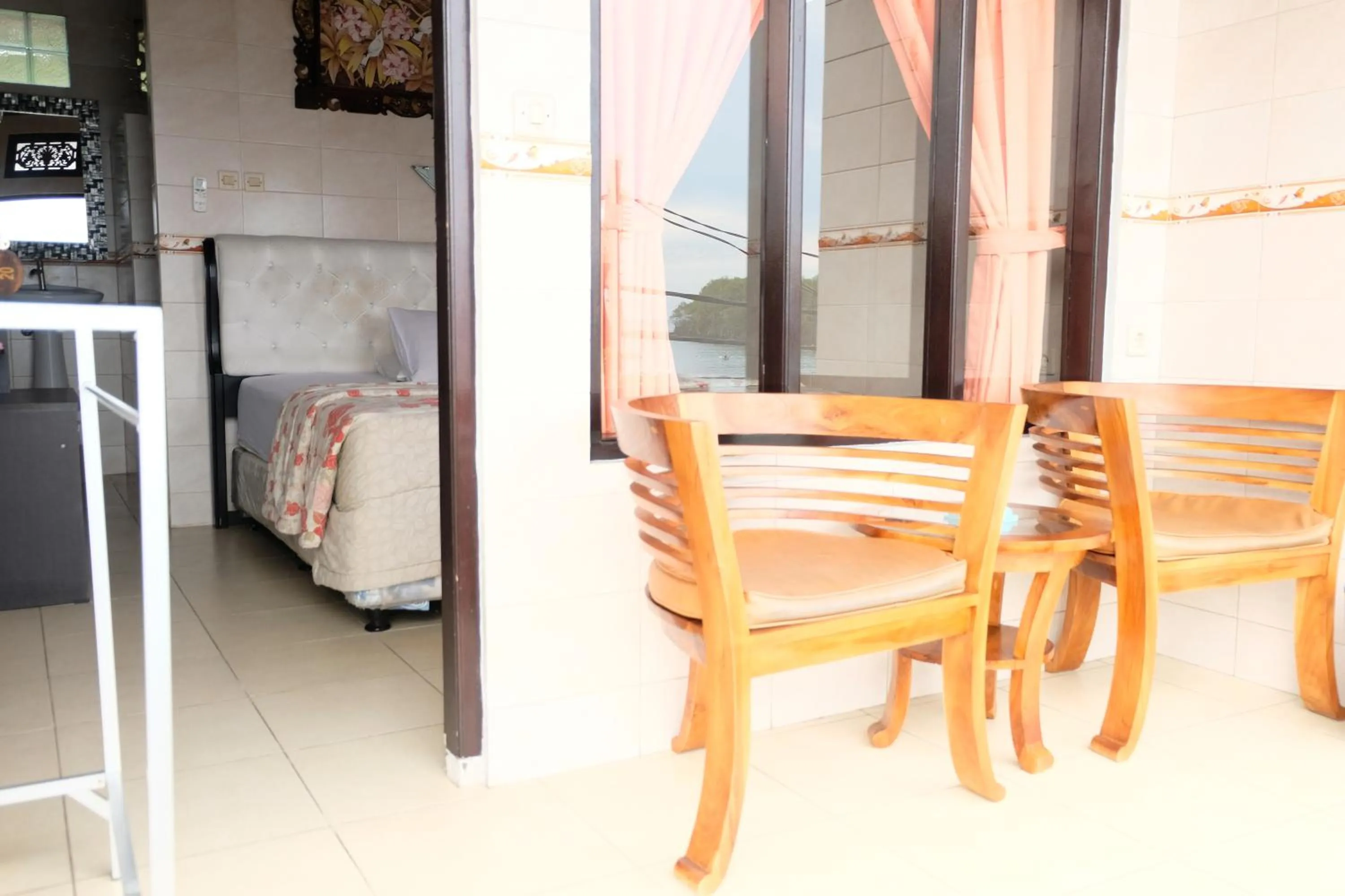 Balcony/Terrace in Kerti Beach Bungalow and Restaurant