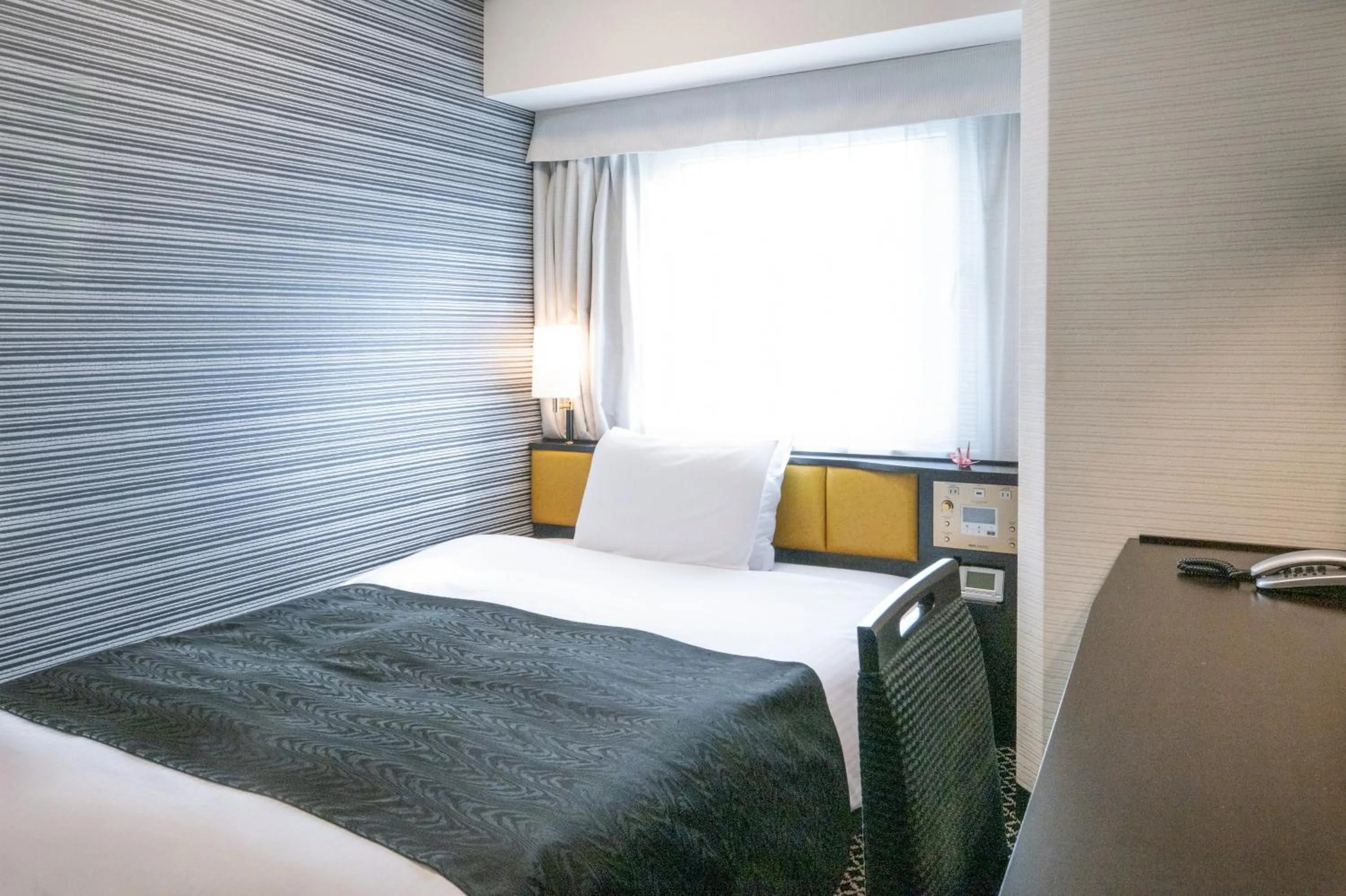 Bed in APA Hotel Asakusa Kaminarimon