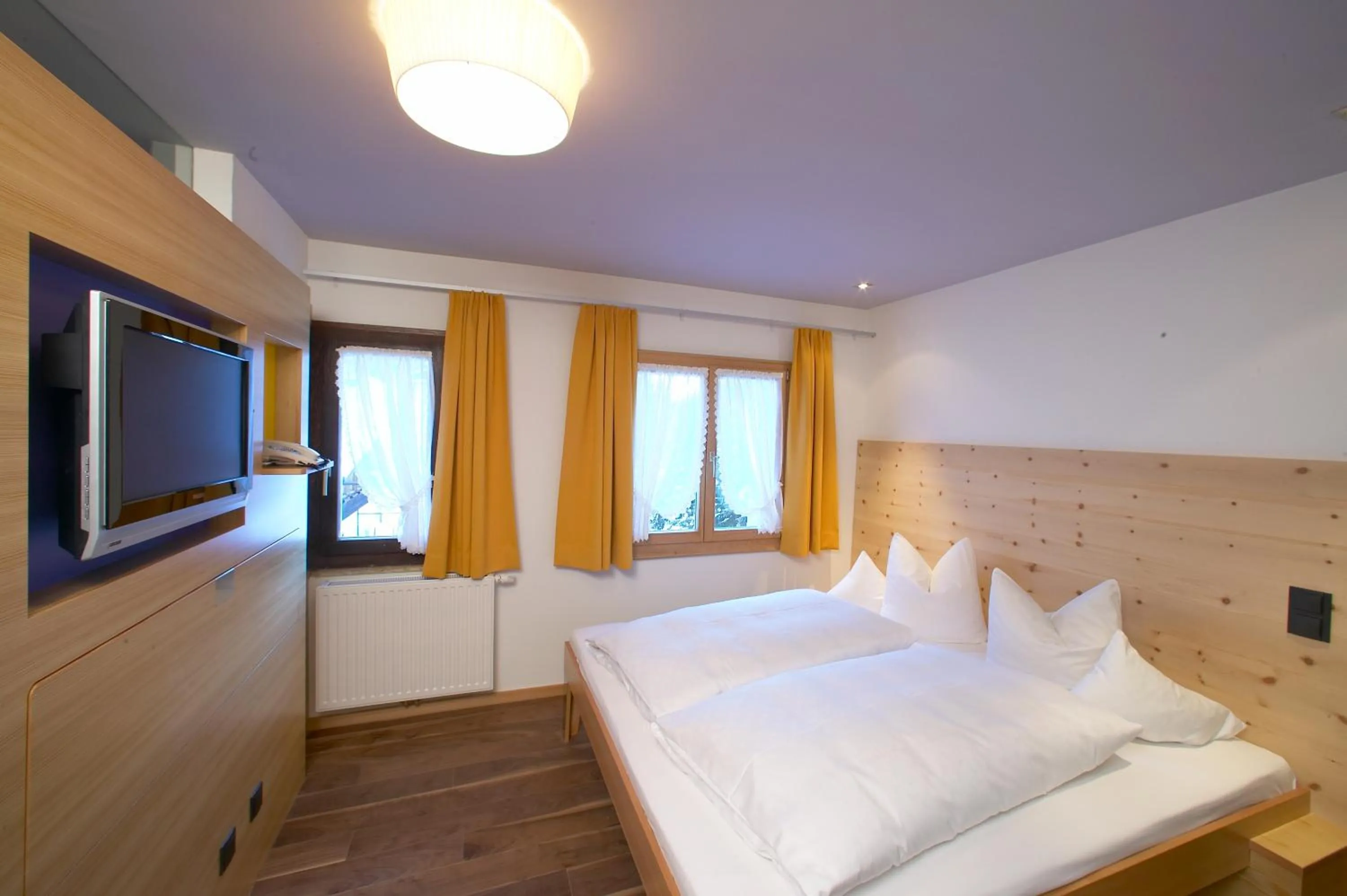 Photo of the whole room, Bed in Familienhotel Mateera Gargellen / Montafon