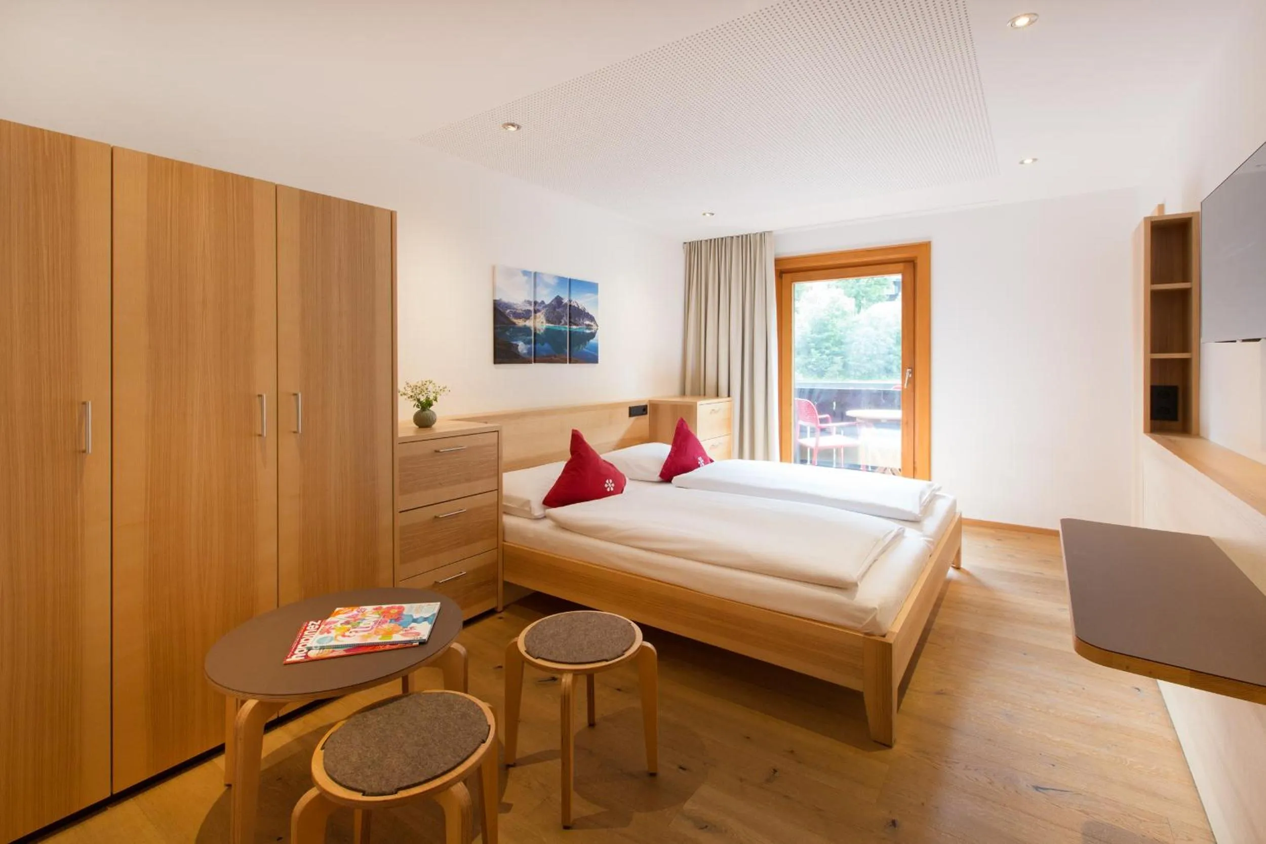 Photo of the whole room, Bed in Familienhotel Mateera Gargellen / Montafon