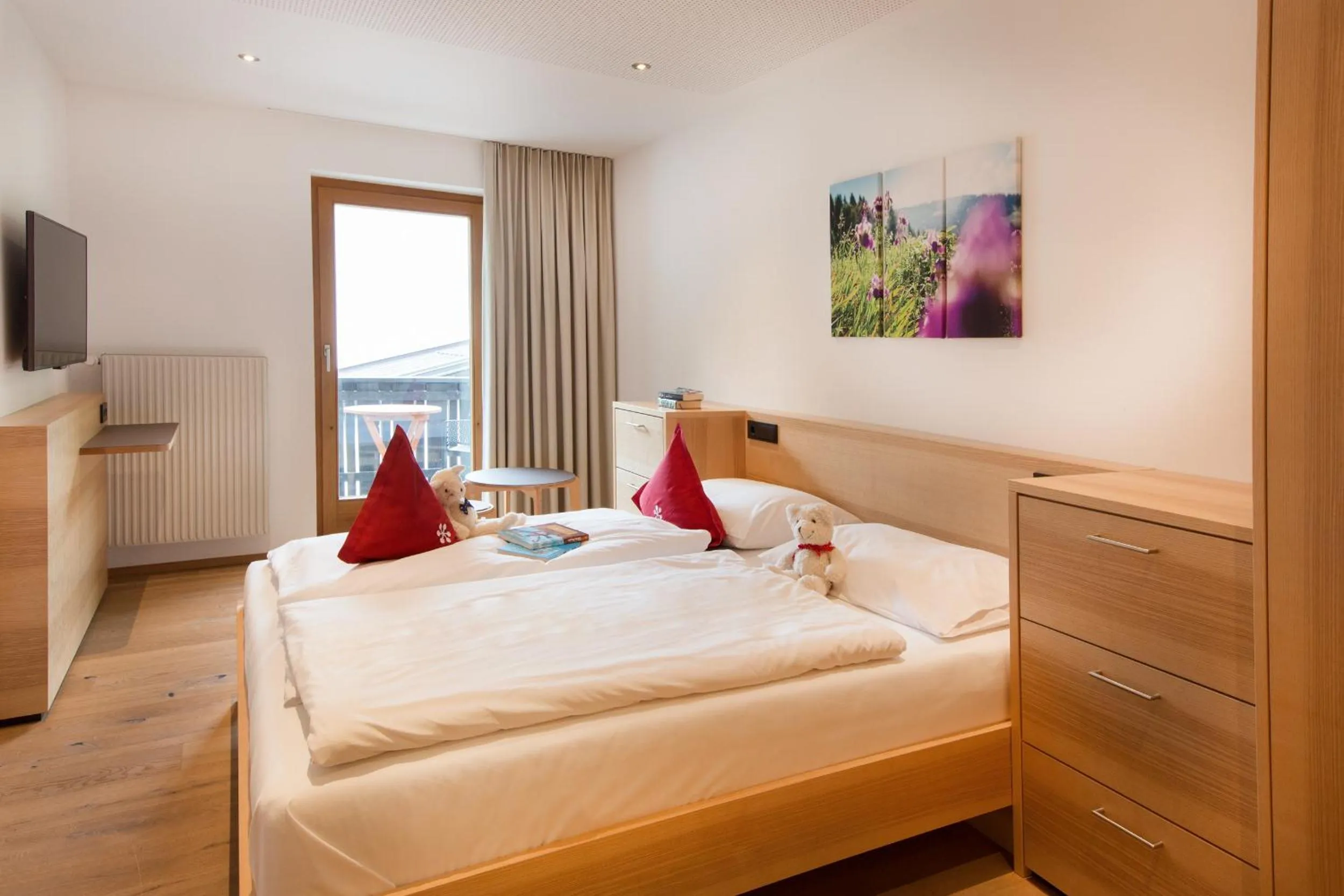 Photo of the whole room, Bed in Familienhotel Mateera Gargellen / Montafon