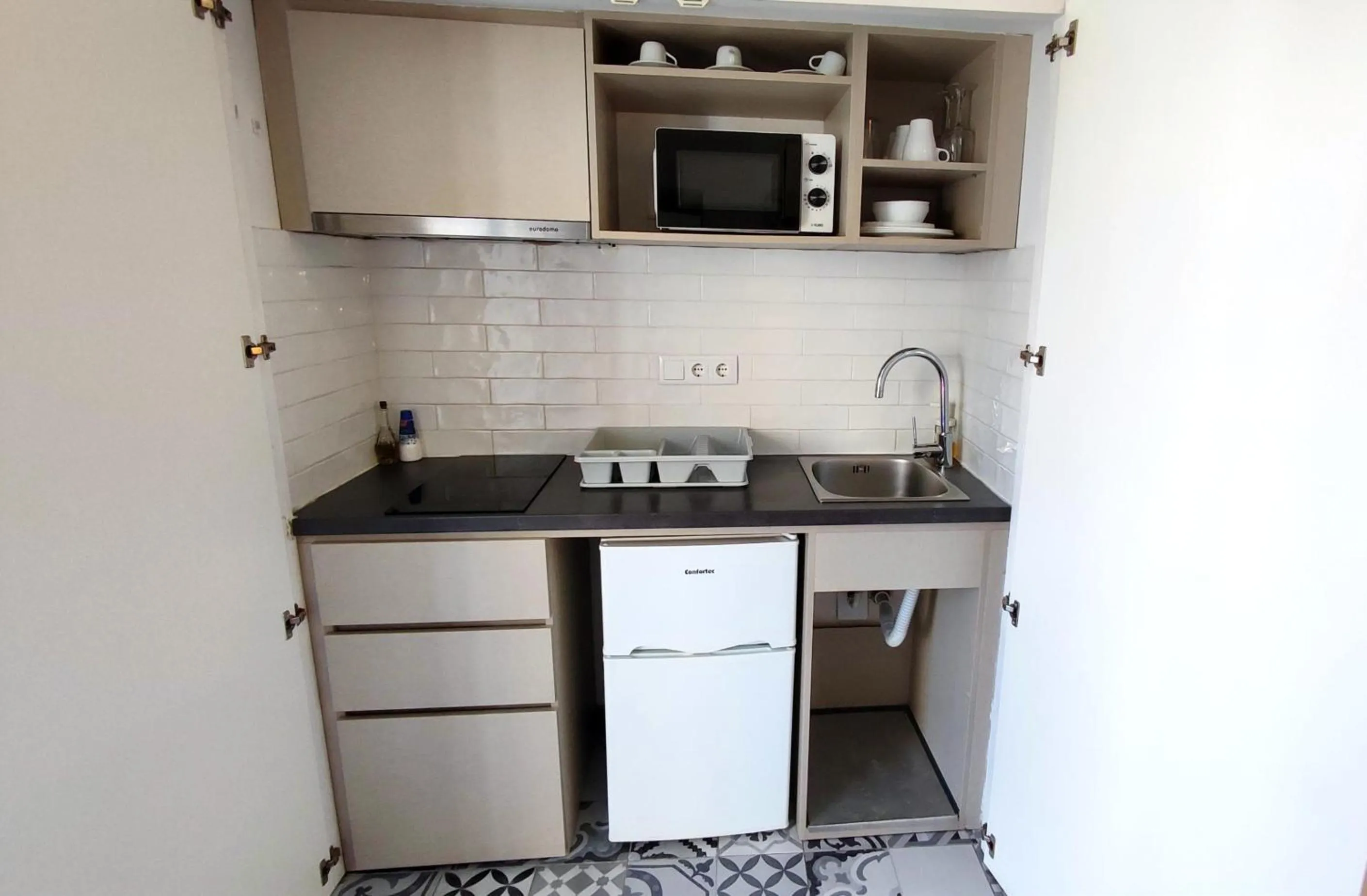 Kitchen or kitchenette in Villas de Cintra