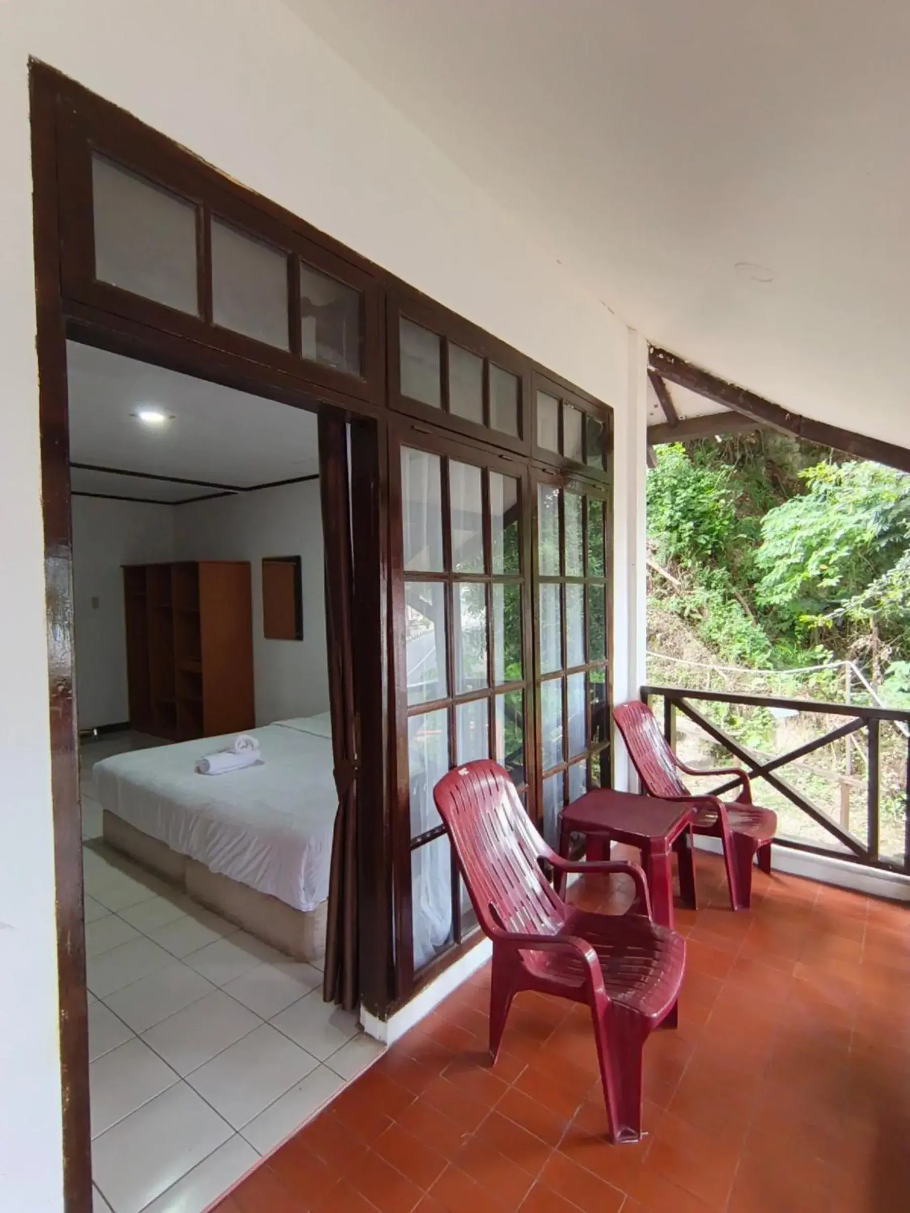 Balcony/Terrace in Hotel Pandu Lakeside Tuktuk Balcony/Terrace in Hotel Pandu Lakeside Tuktuk