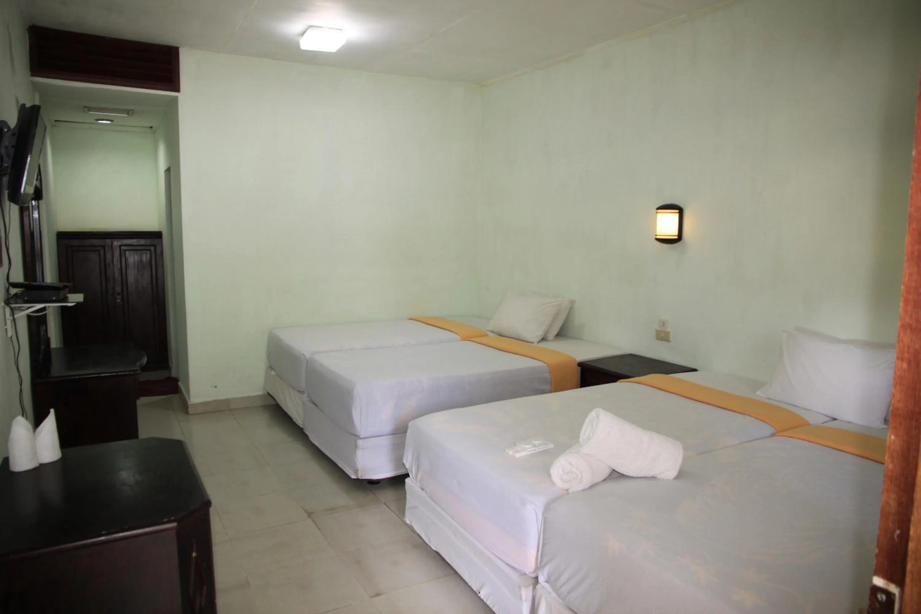 Bed in Pandu Lakeside Hotel Parapat