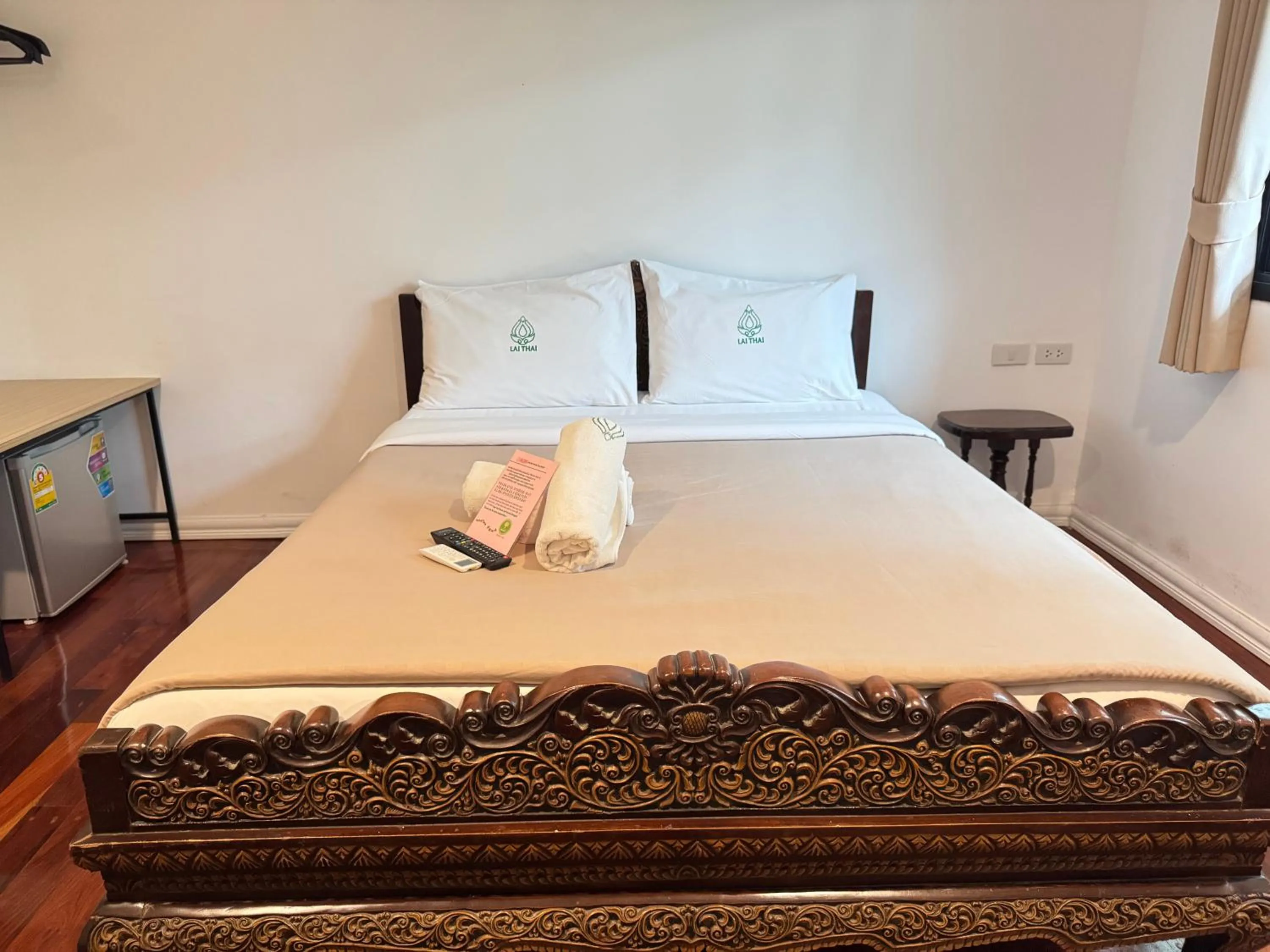 Bed in Lai Thai Guest House