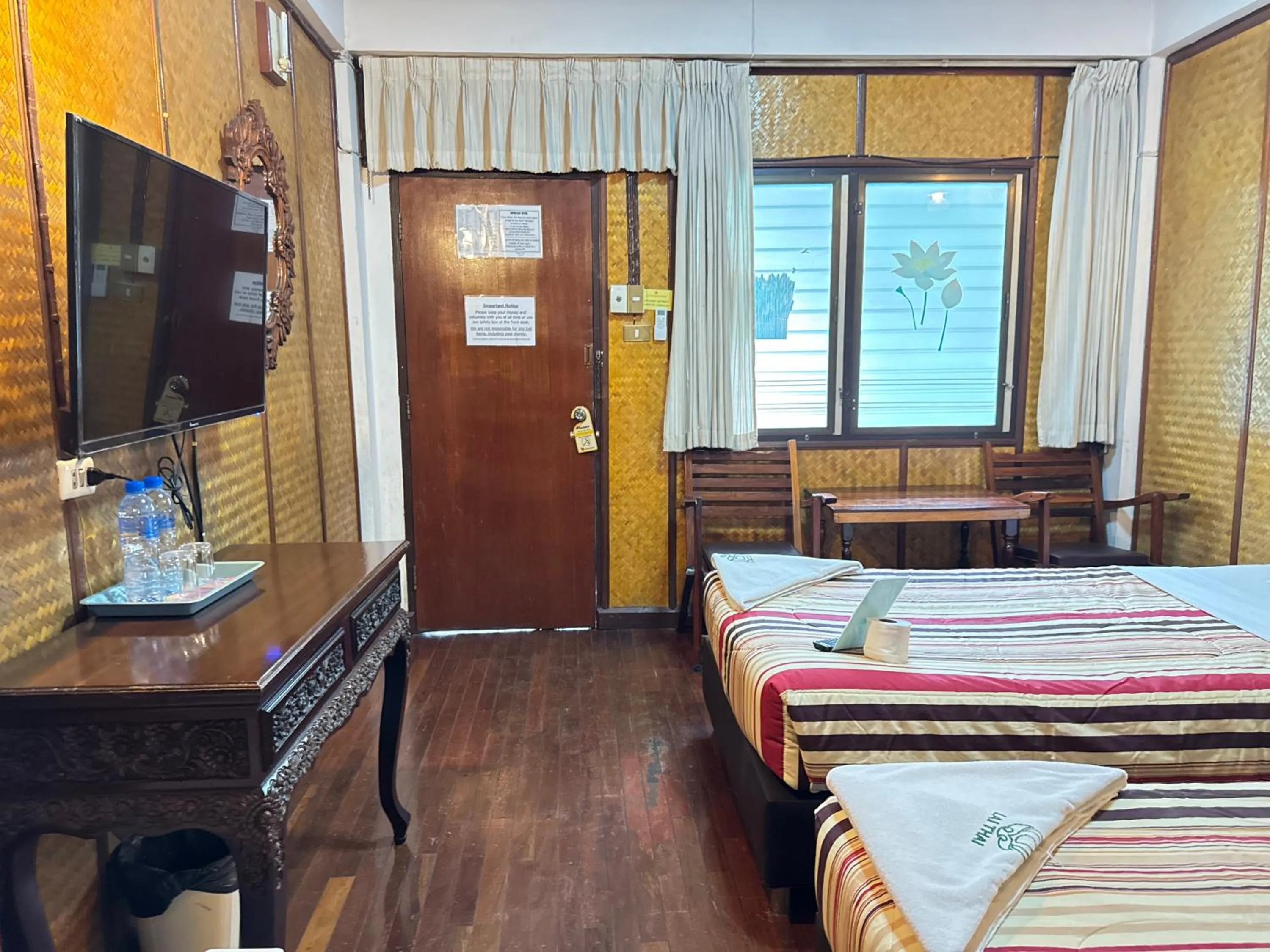 Bed in Lai Thai Guest House