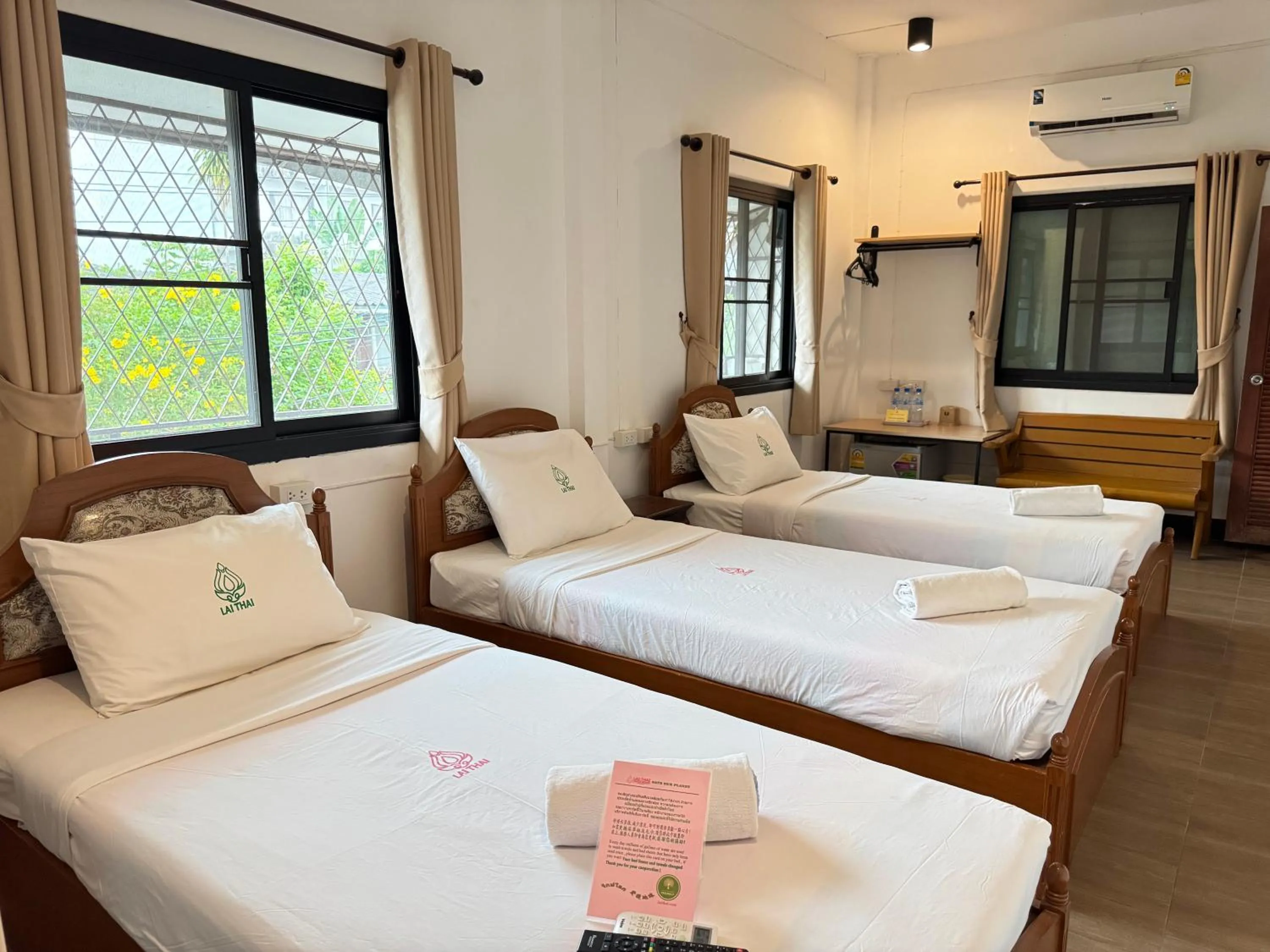 Bed in Lai Thai Guest House