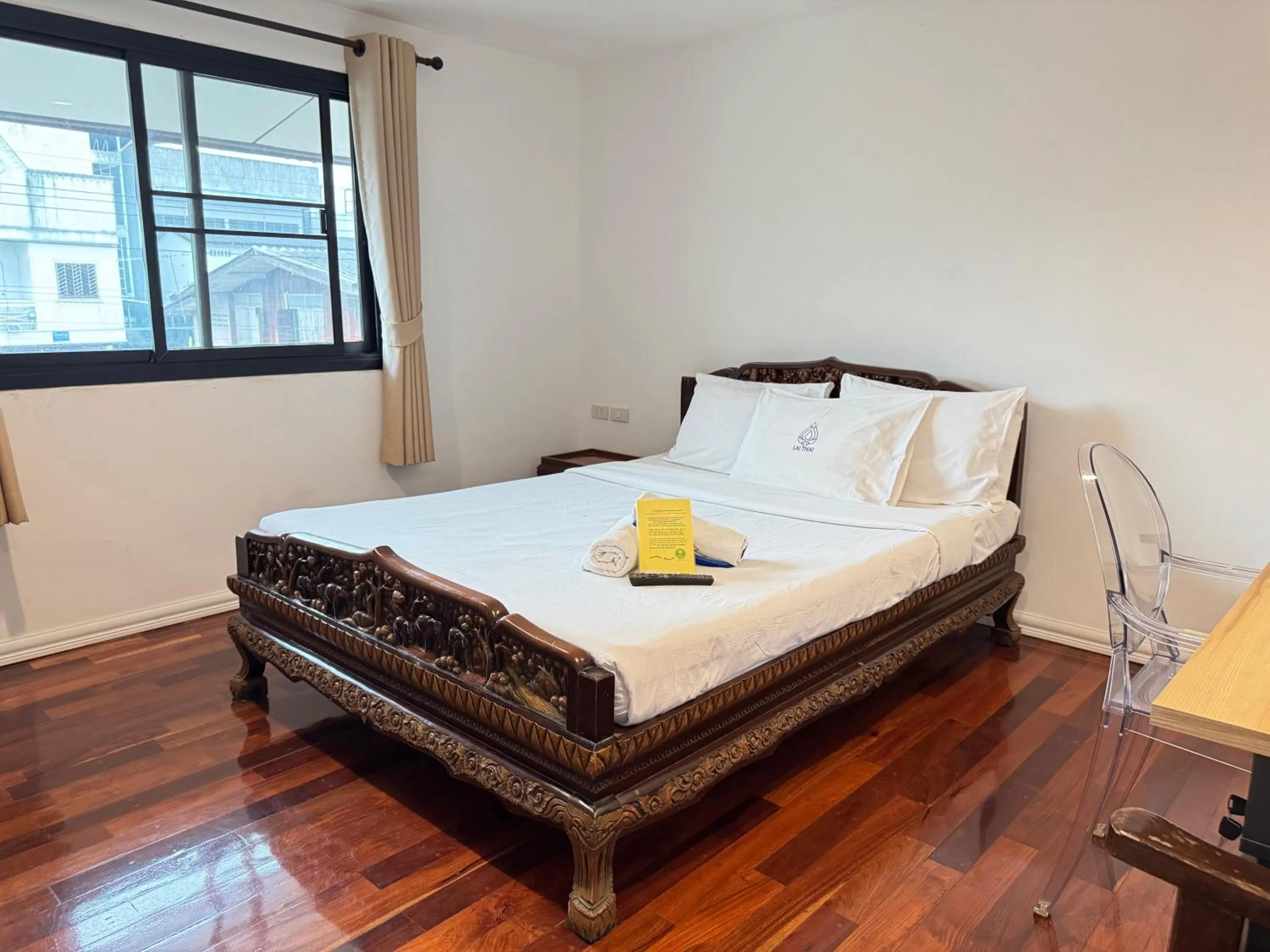 Bed in Lai Thai Guest House