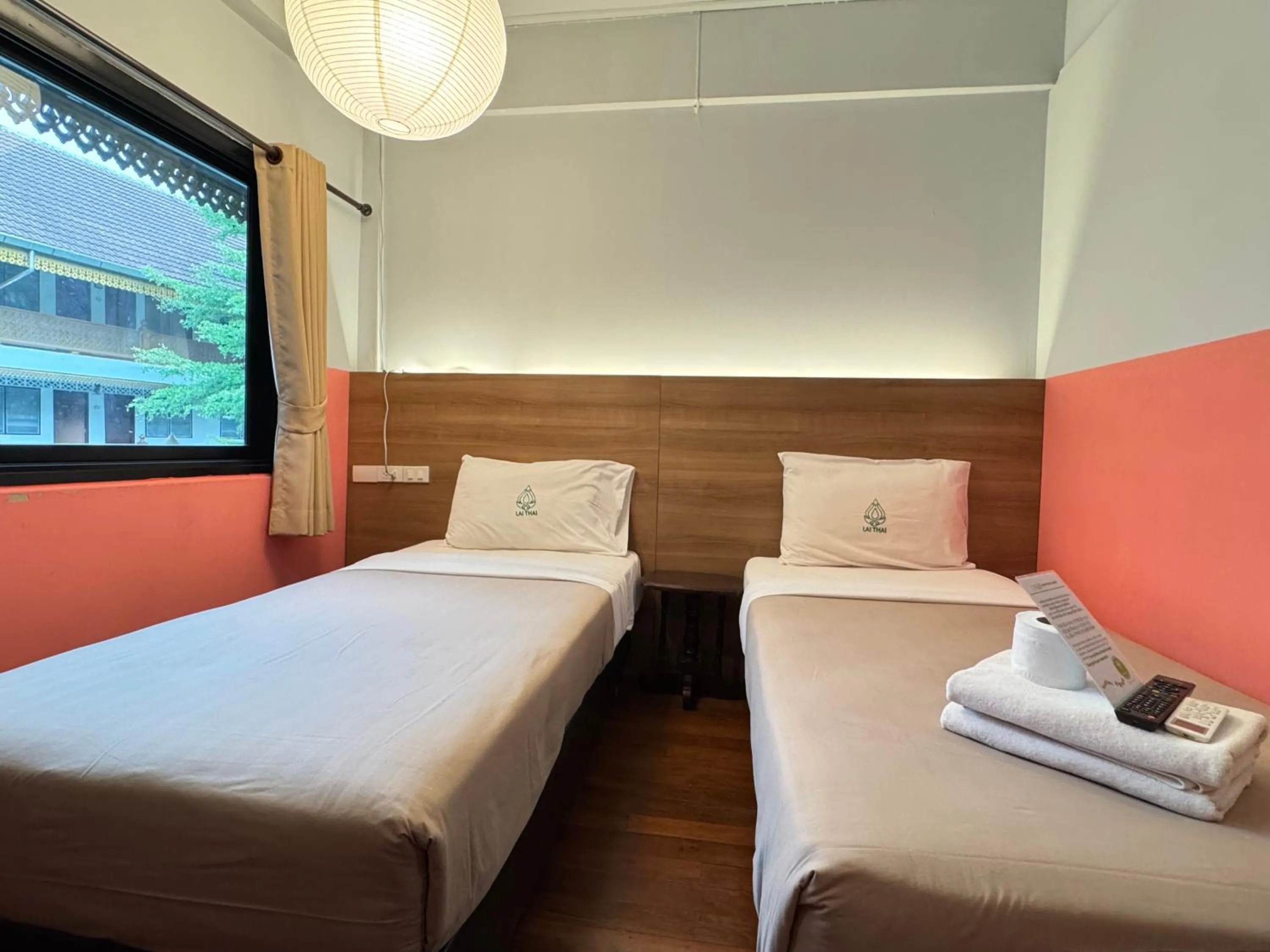 Bed in Lai Thai Guest House