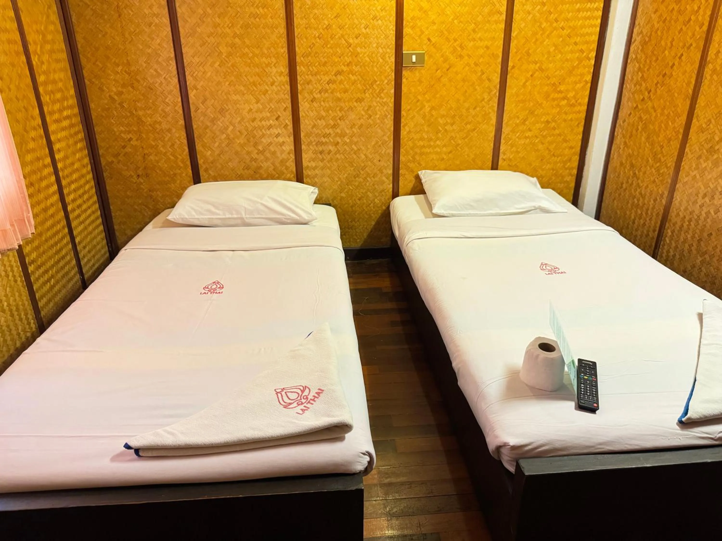 Bed in Lai Thai Guest House