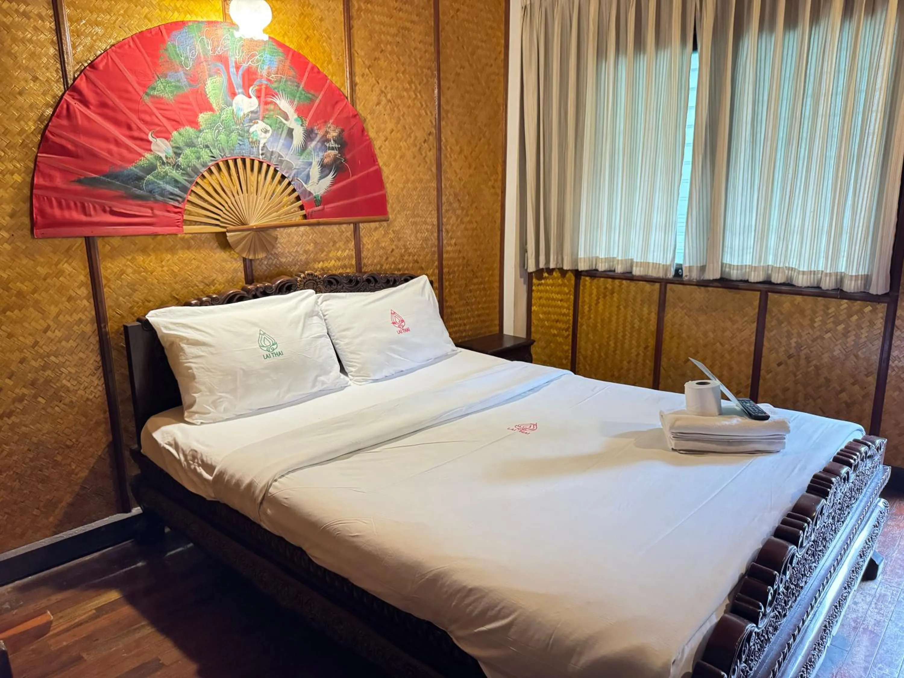Bed in Lai Thai Guest House