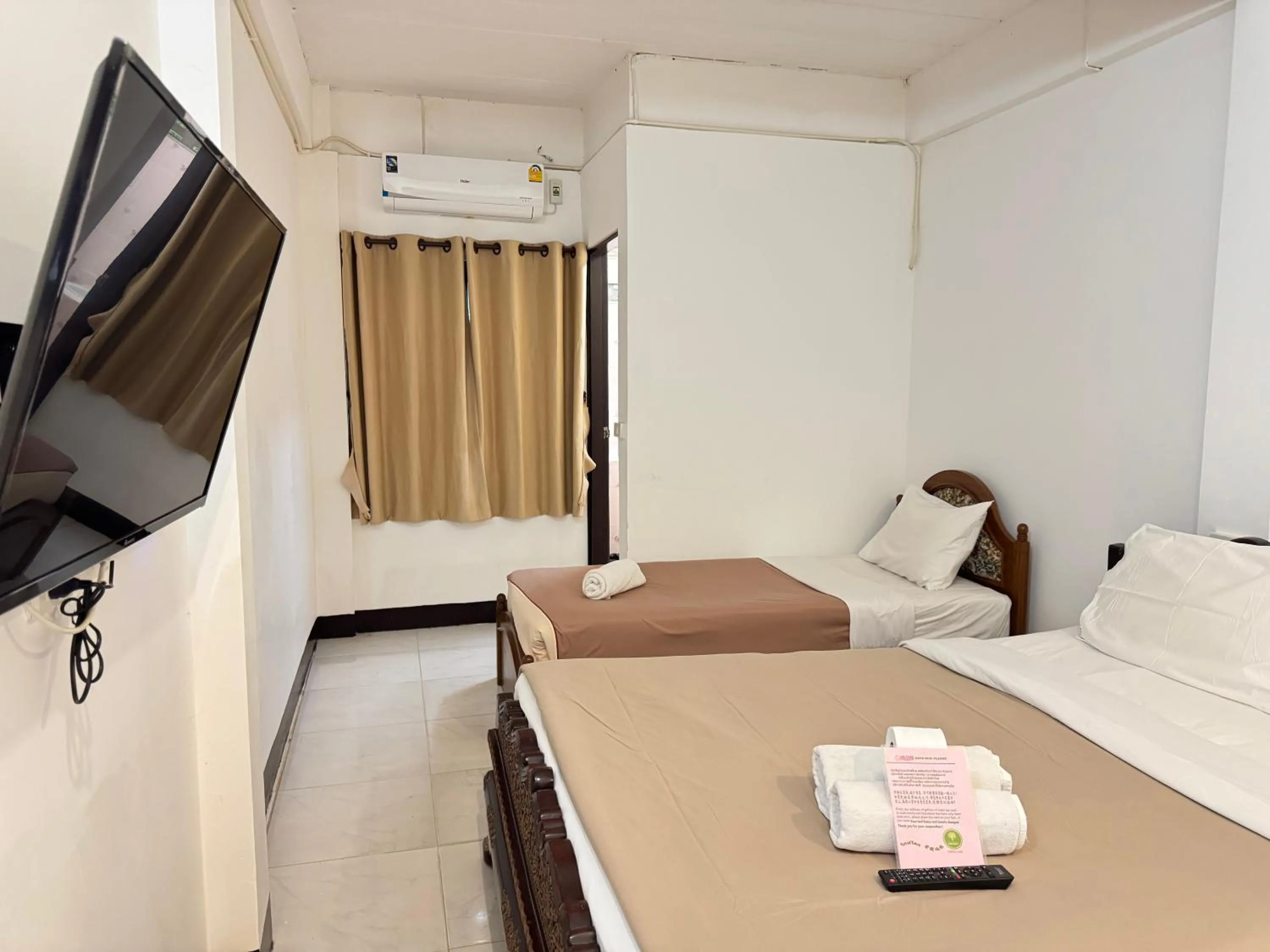 Bed in Lai Thai Guest House