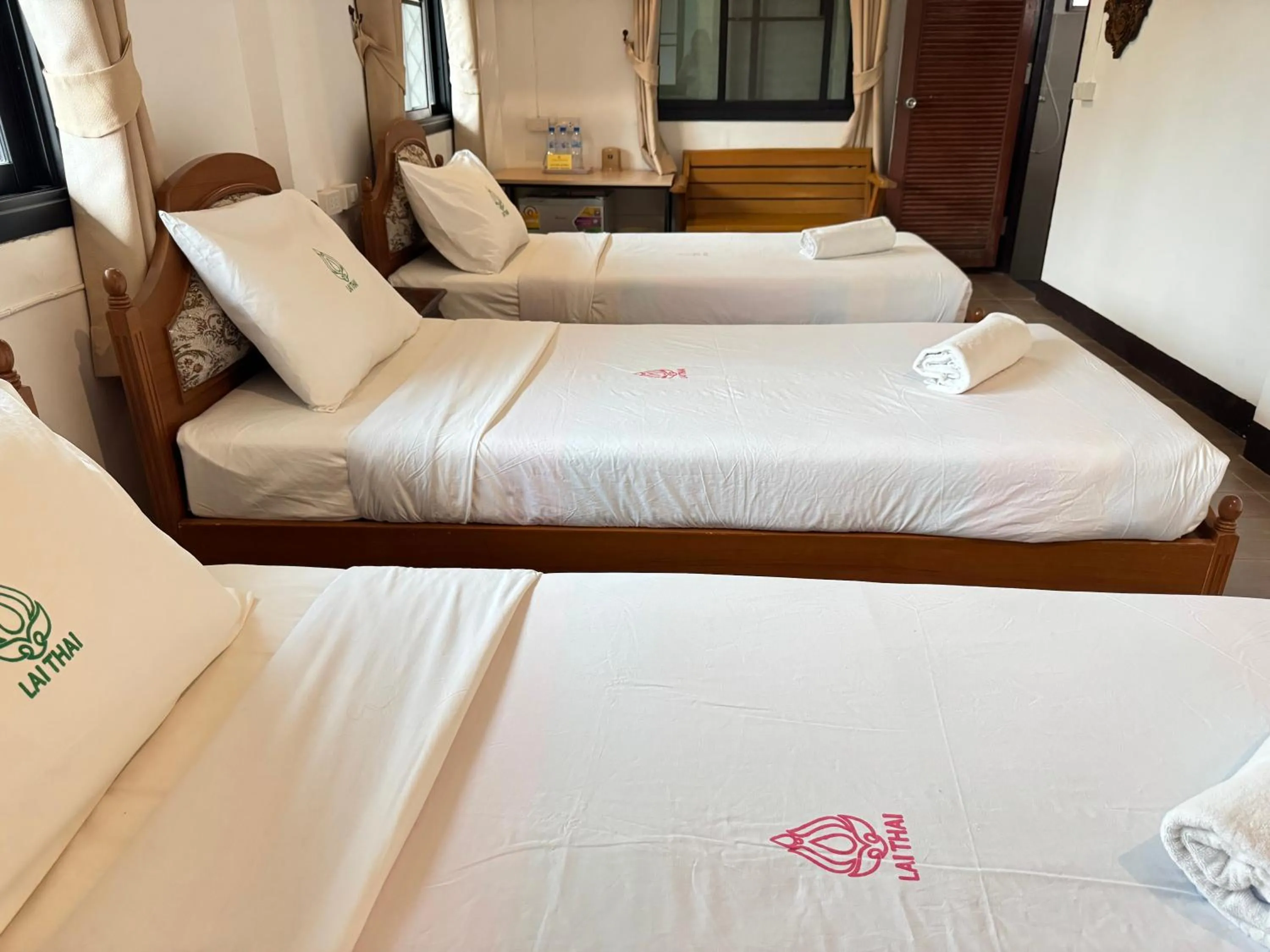 Bed in Lai Thai Guest House