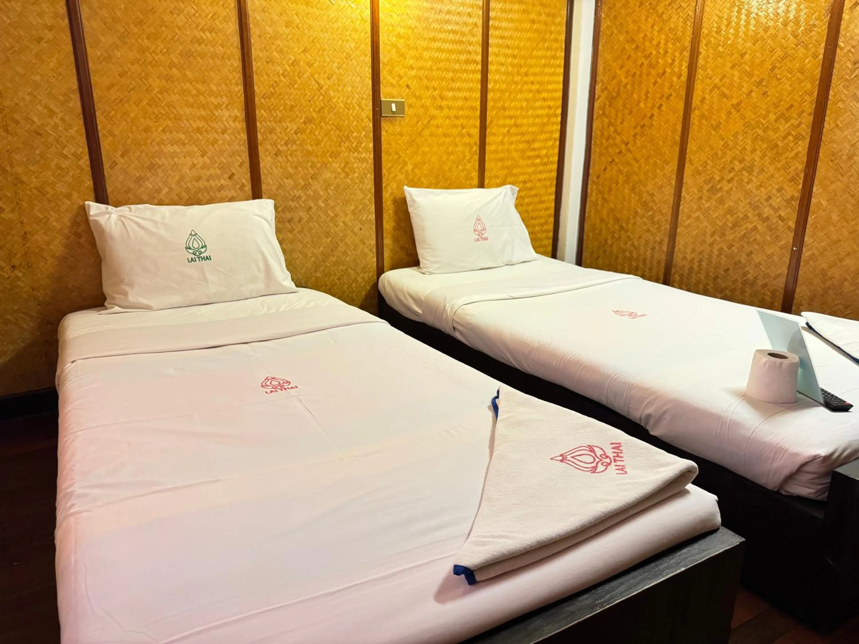 Bed in Lai Thai Guest House