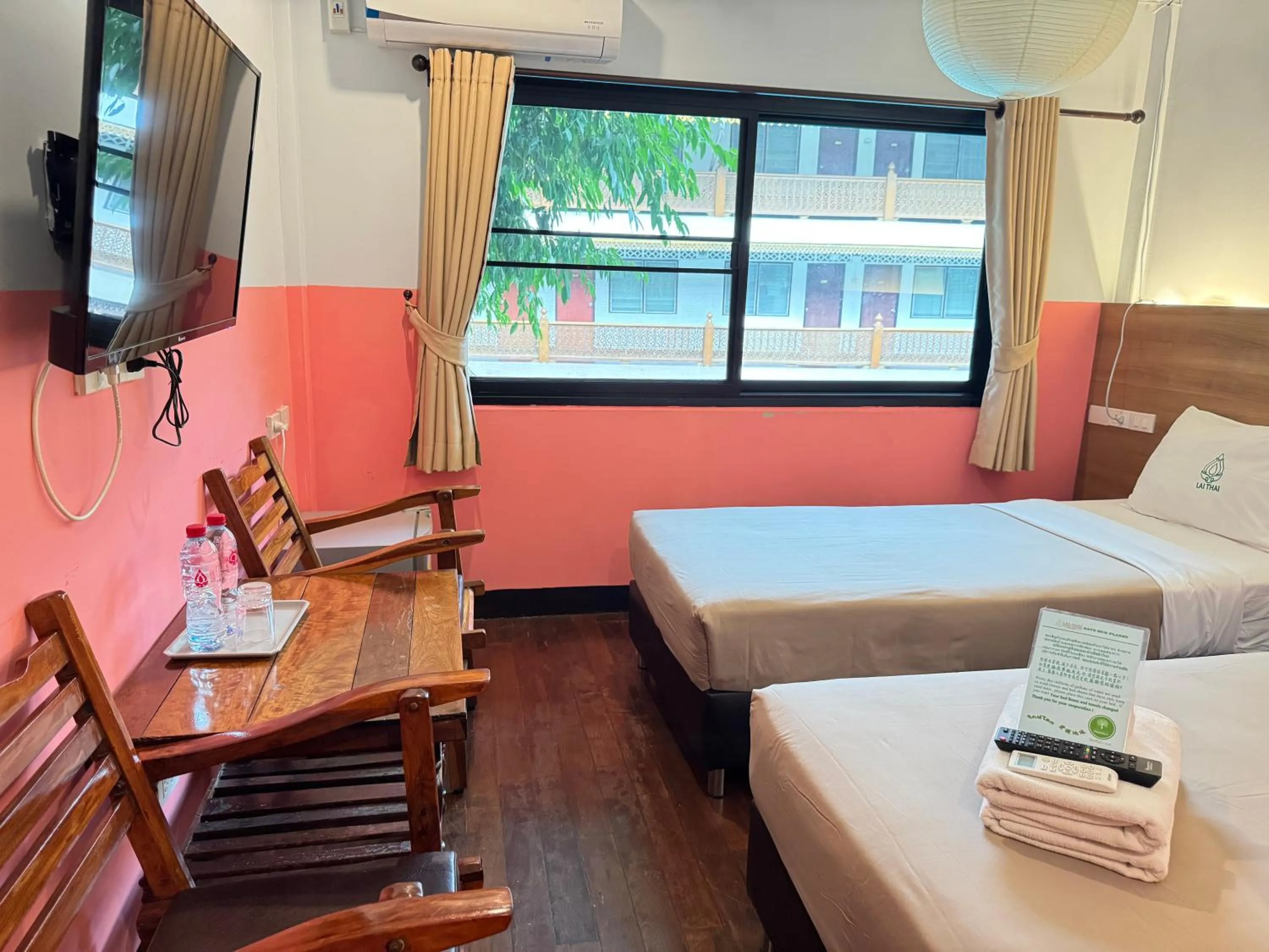 Bed in Lai Thai Guest House