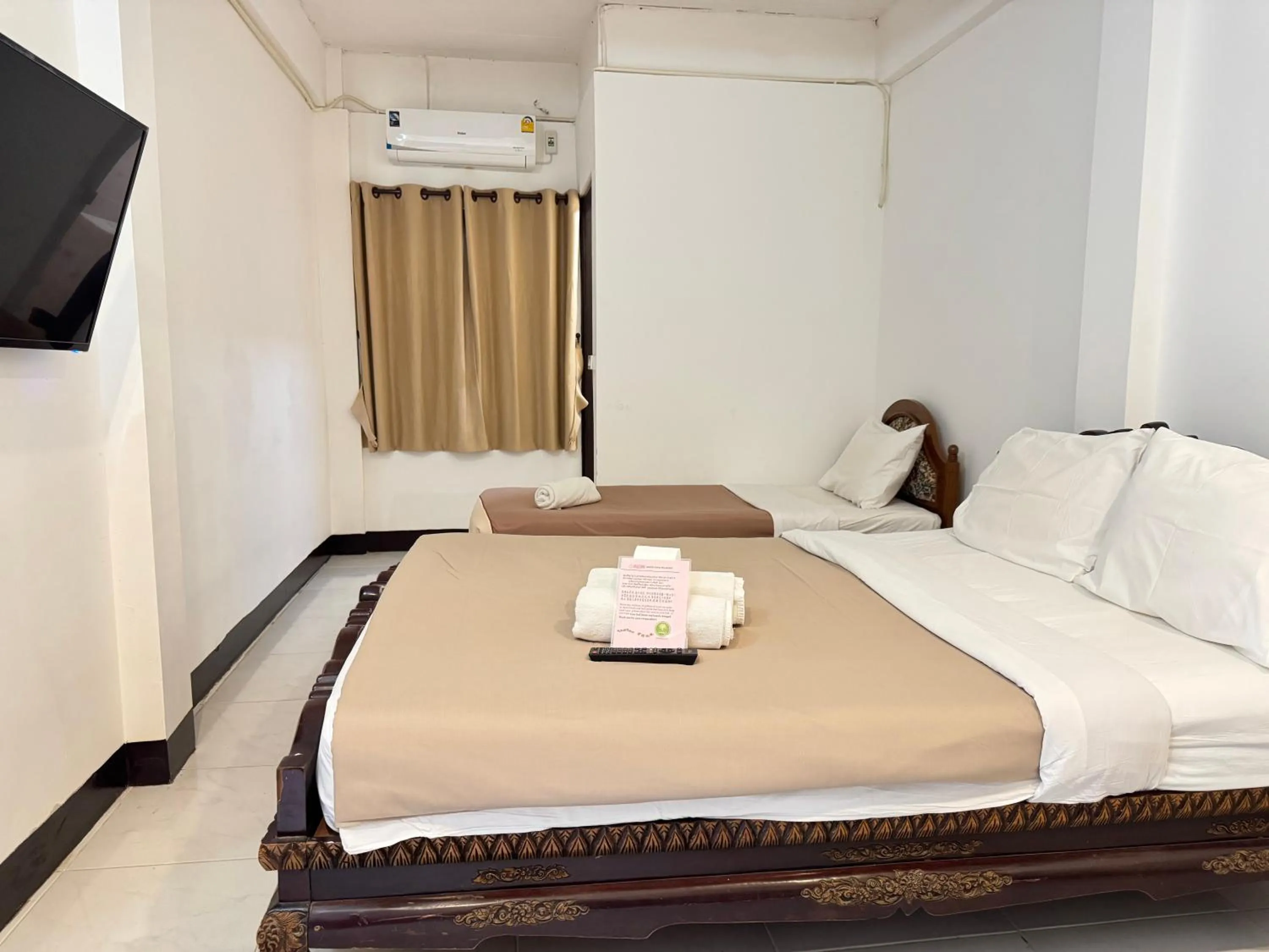Bed in Lai Thai Guest House