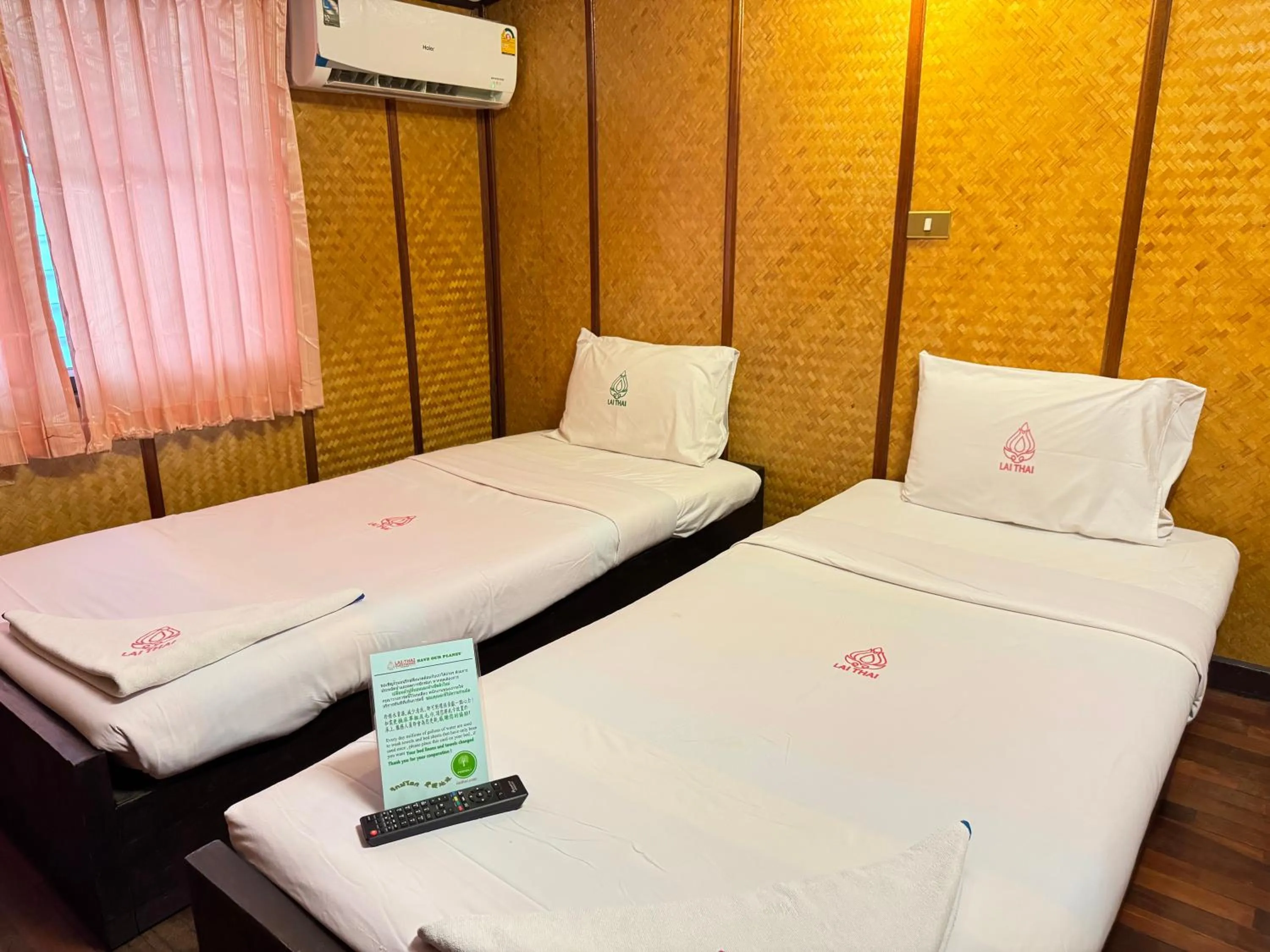 Bed in Lai Thai Guest House