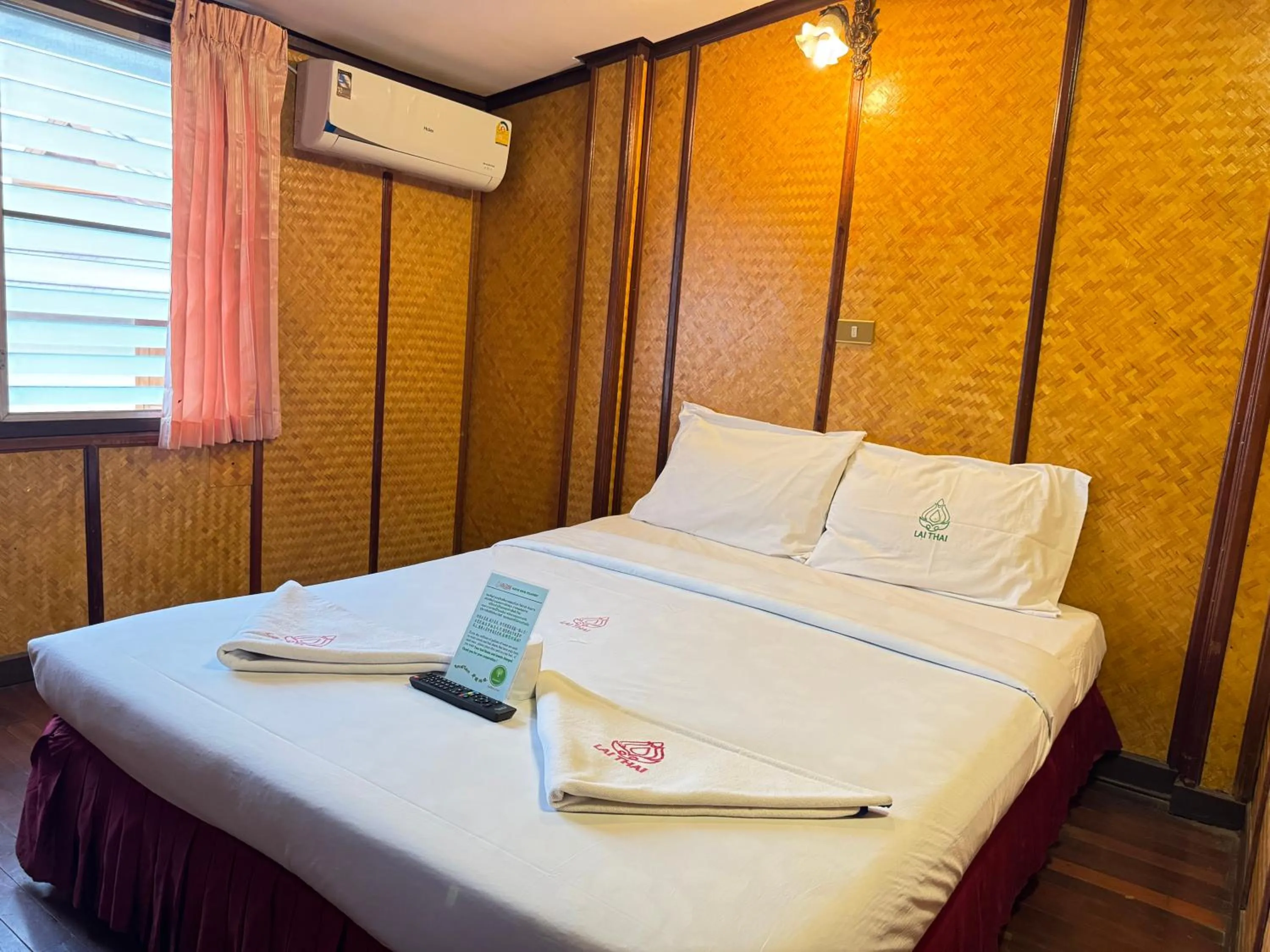 Bed in Lai Thai Guest House