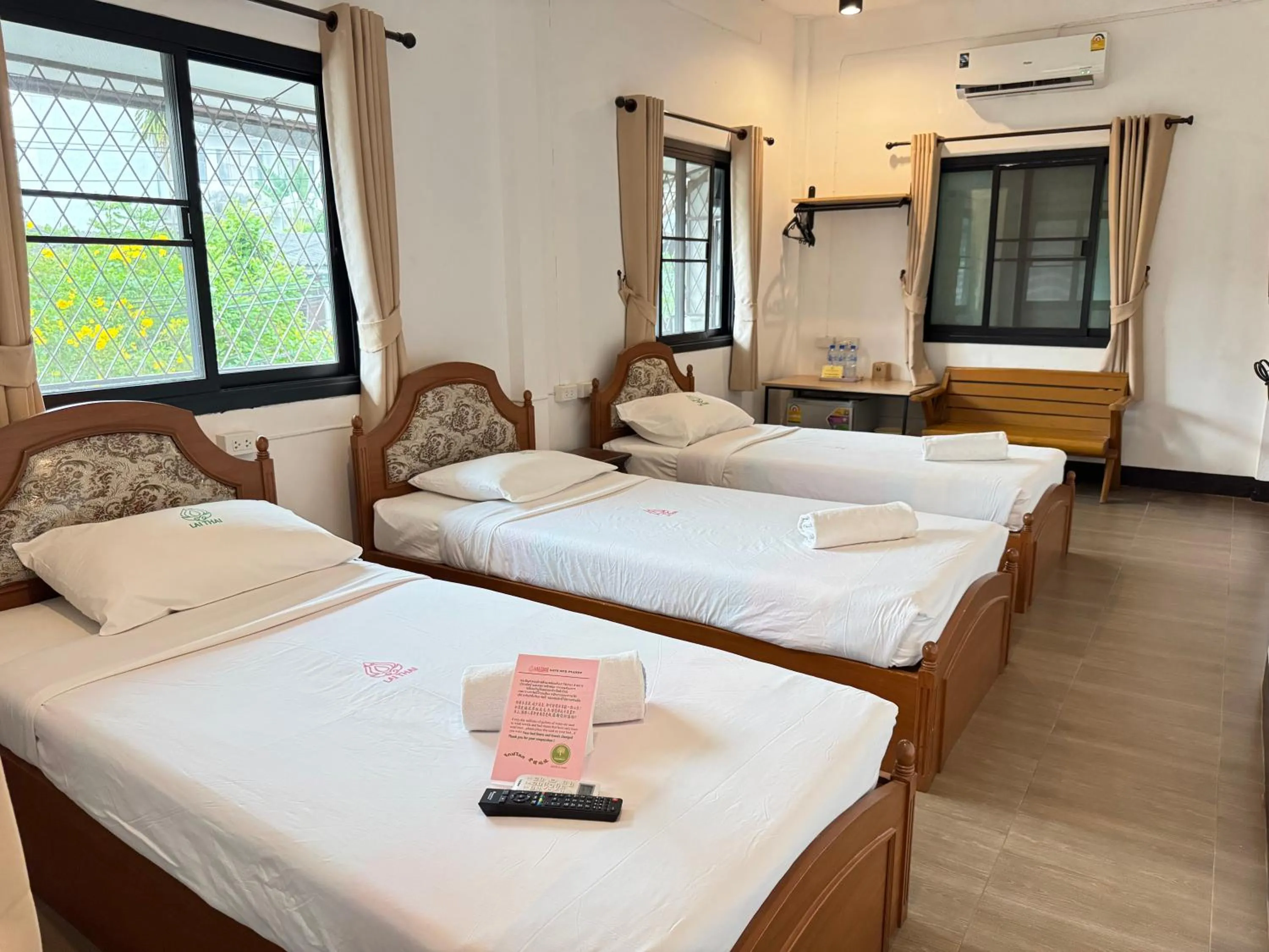 Bed in Lai Thai Guest House