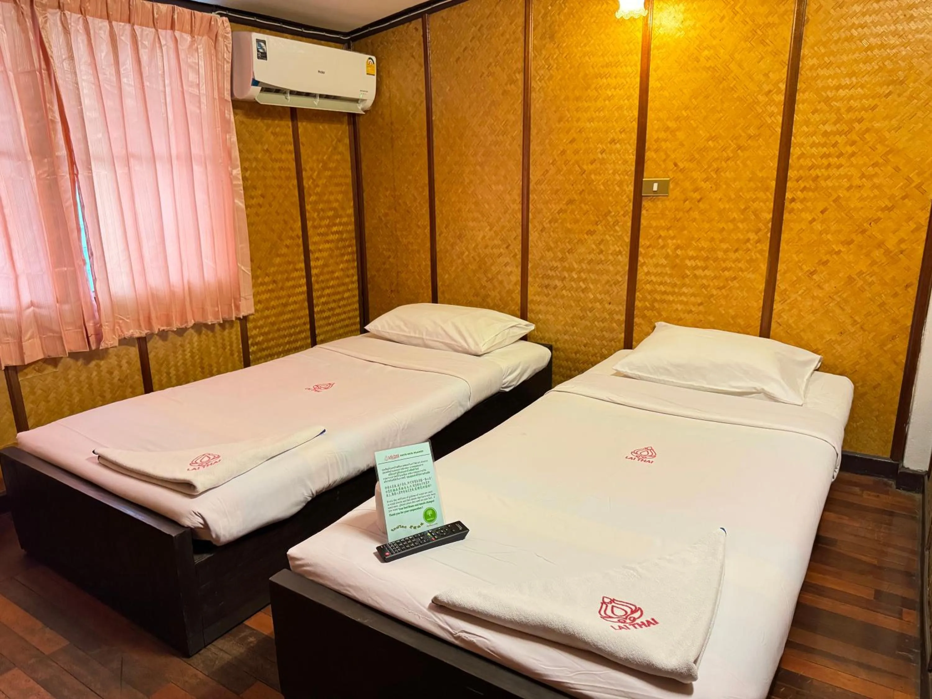 Bed in Lai Thai Guest House