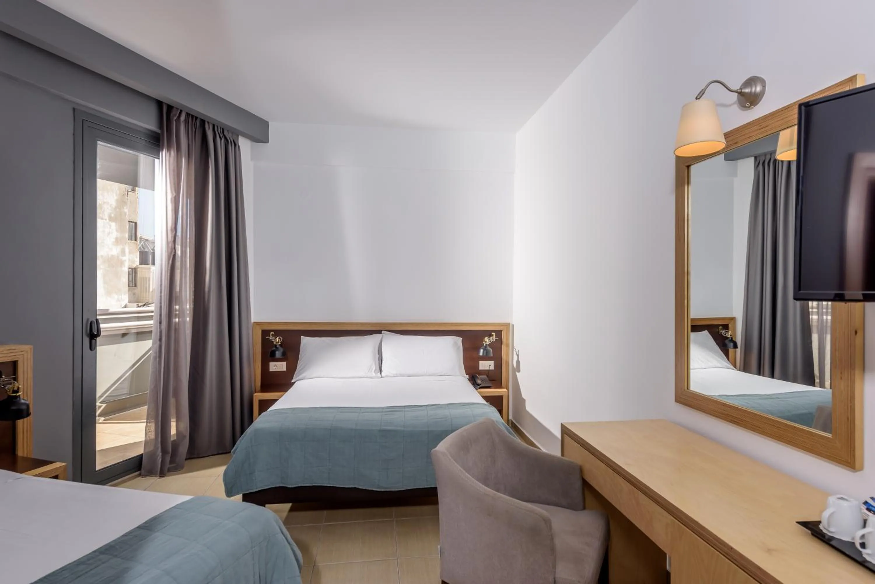 Bathroom, Bed in Iraklion Hotel