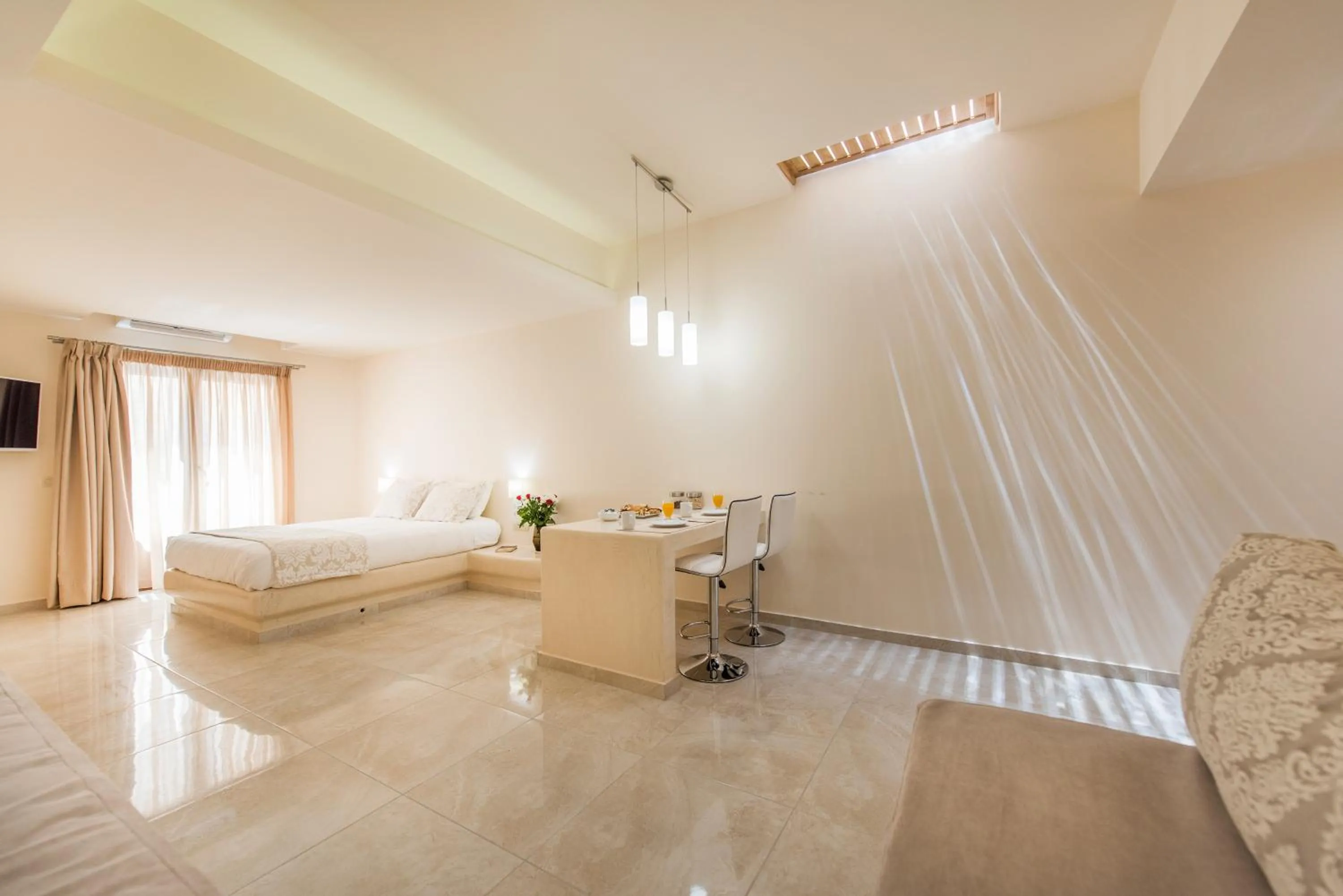 Bed in Perla Nera Suites