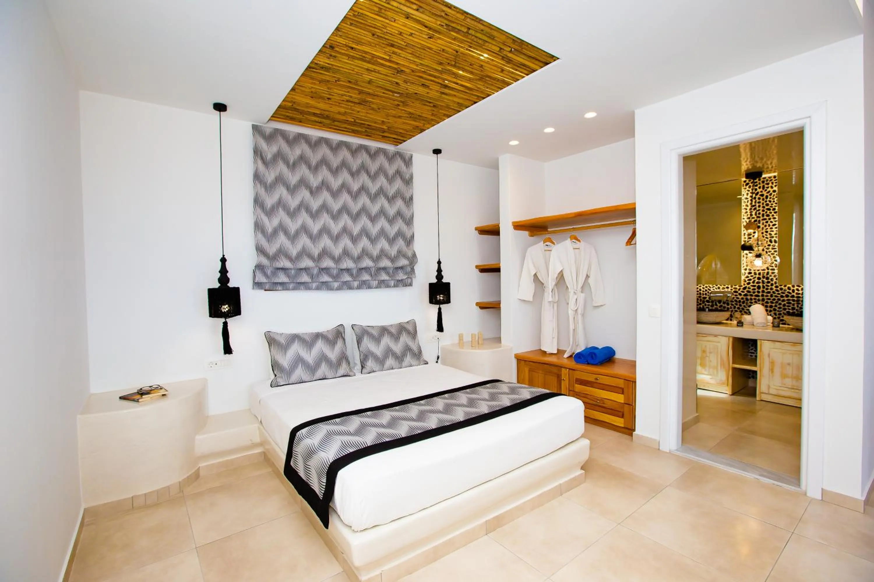 Bed in Perla Nera Suites