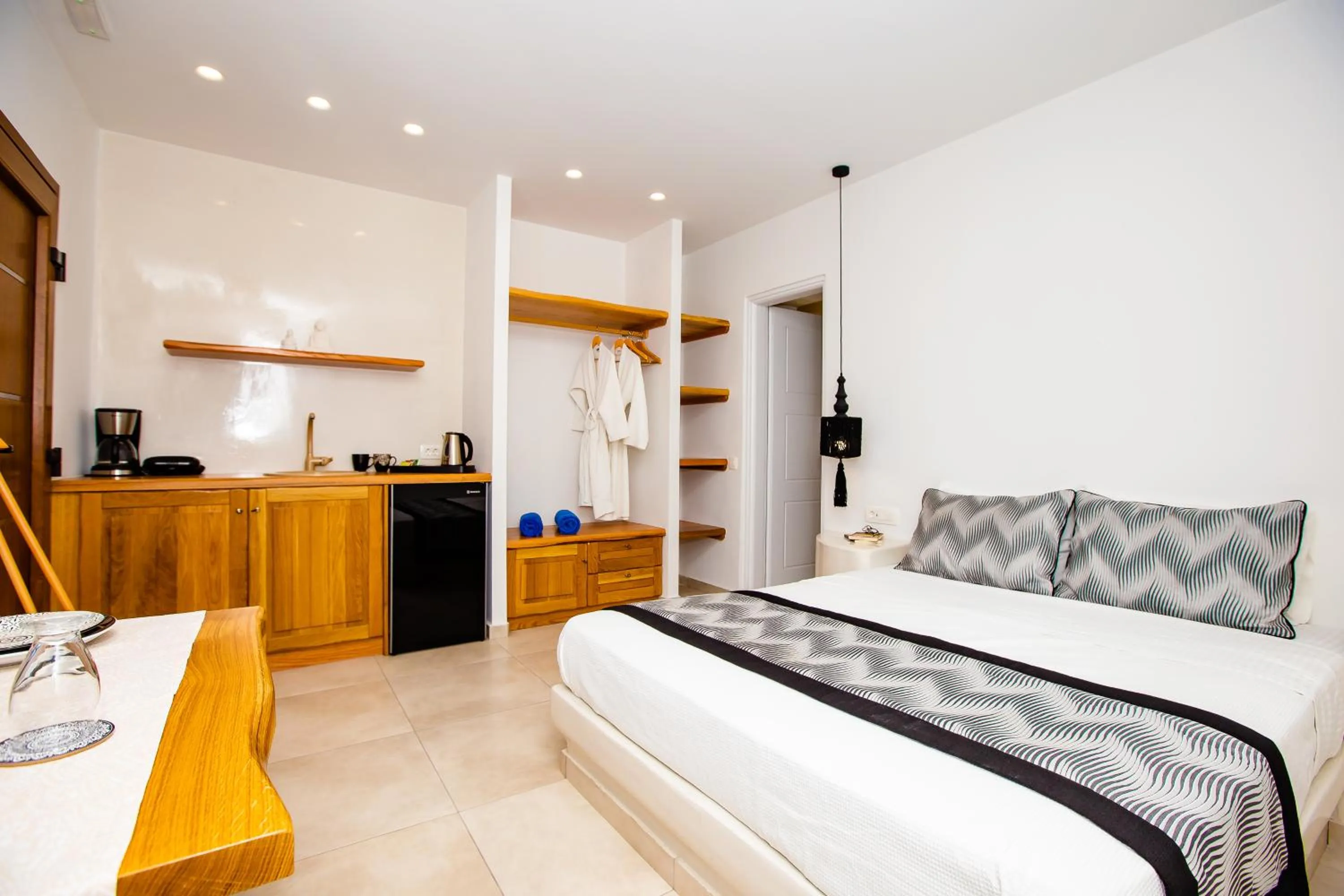 Bed in Perla Nera Suites