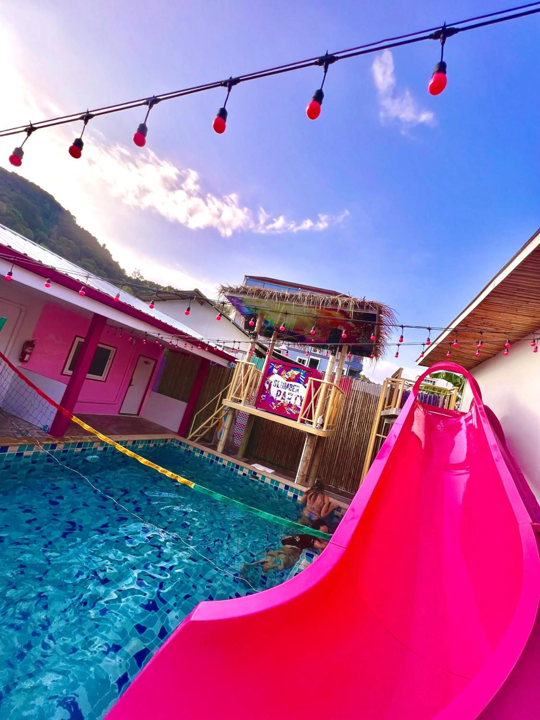 Communal lounge/ TV room in Slumber Party Krabi