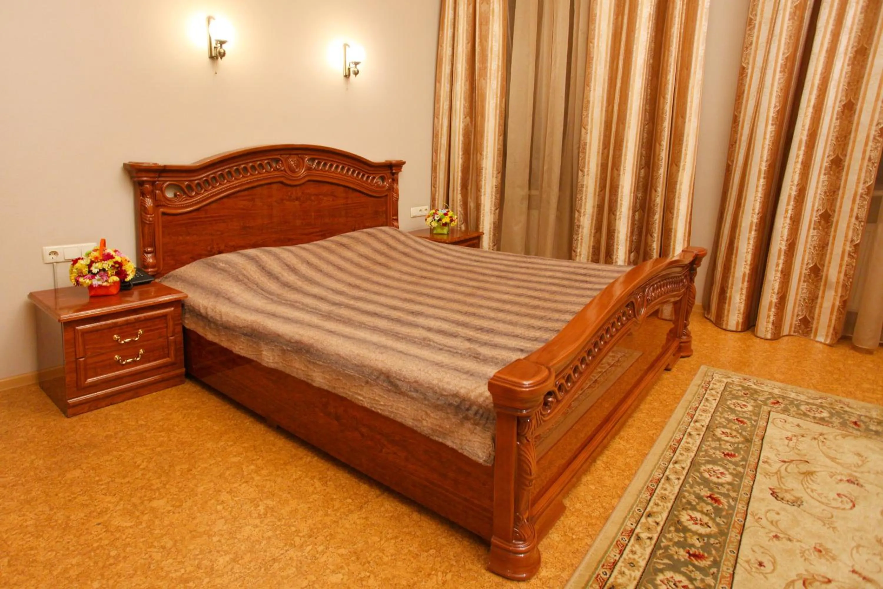 Bed in Ekaterina Hotel