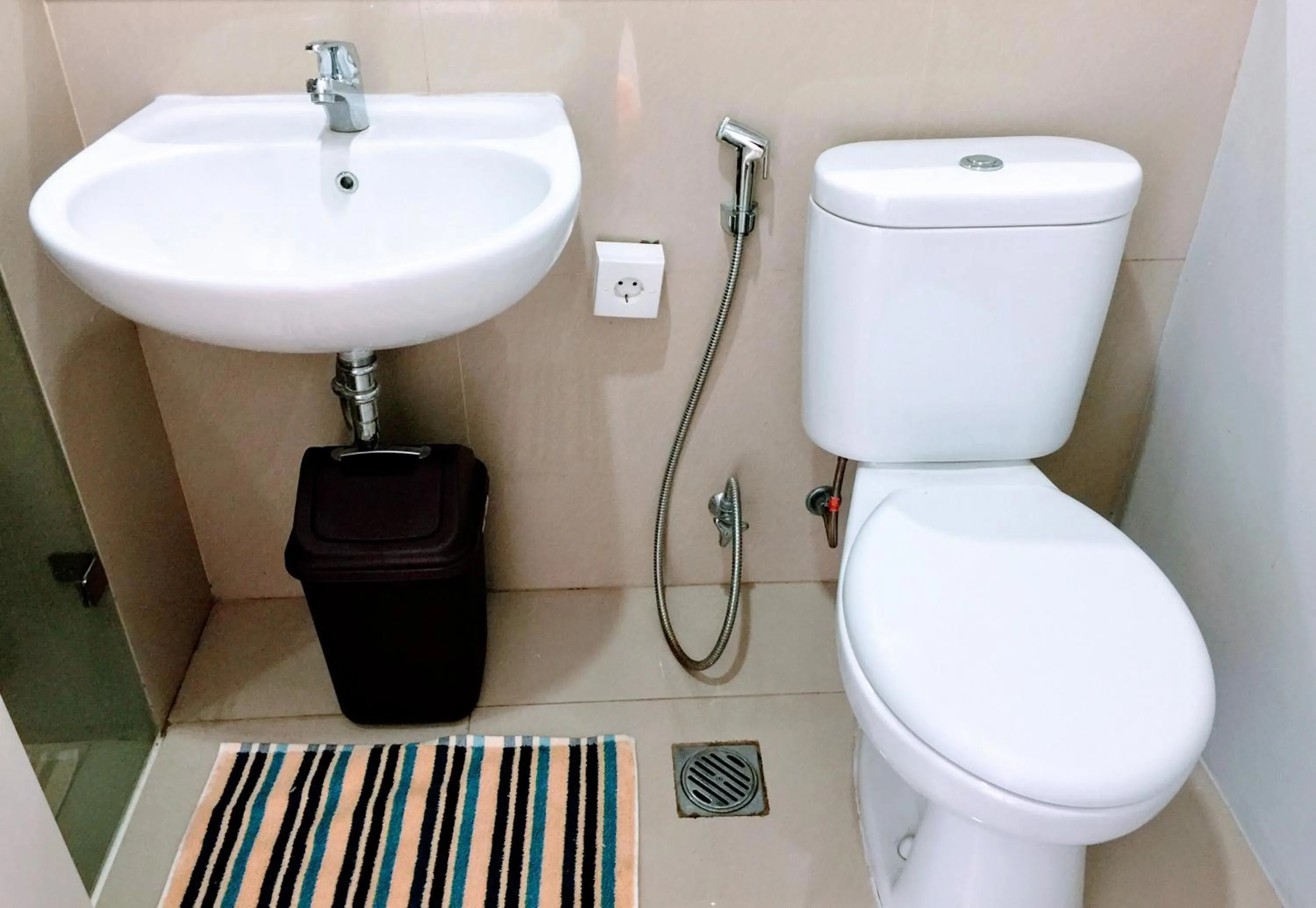 Bathroom in TechieRoom Kotlin at Clove Garden Residence