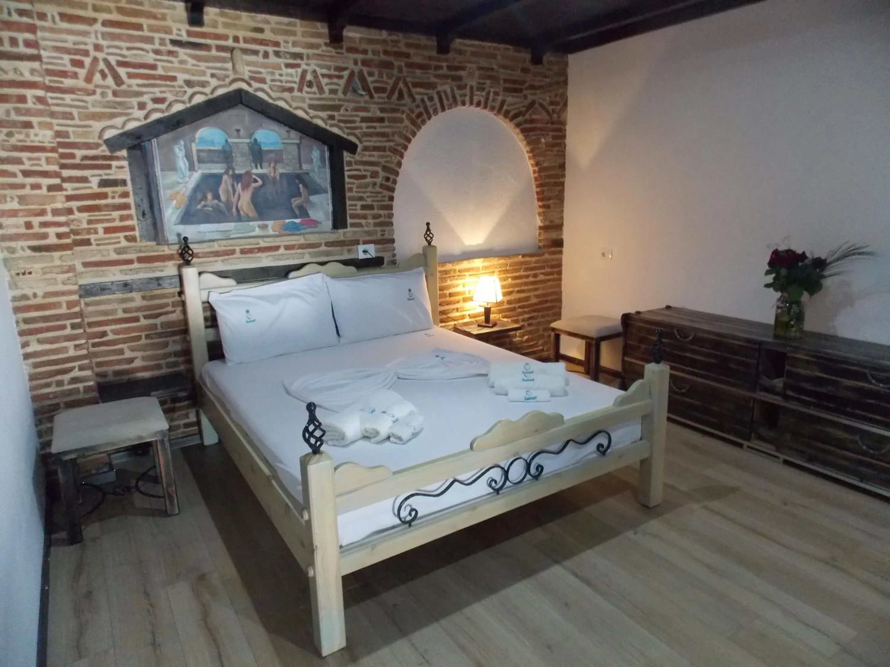 Bed in Sunset Suites