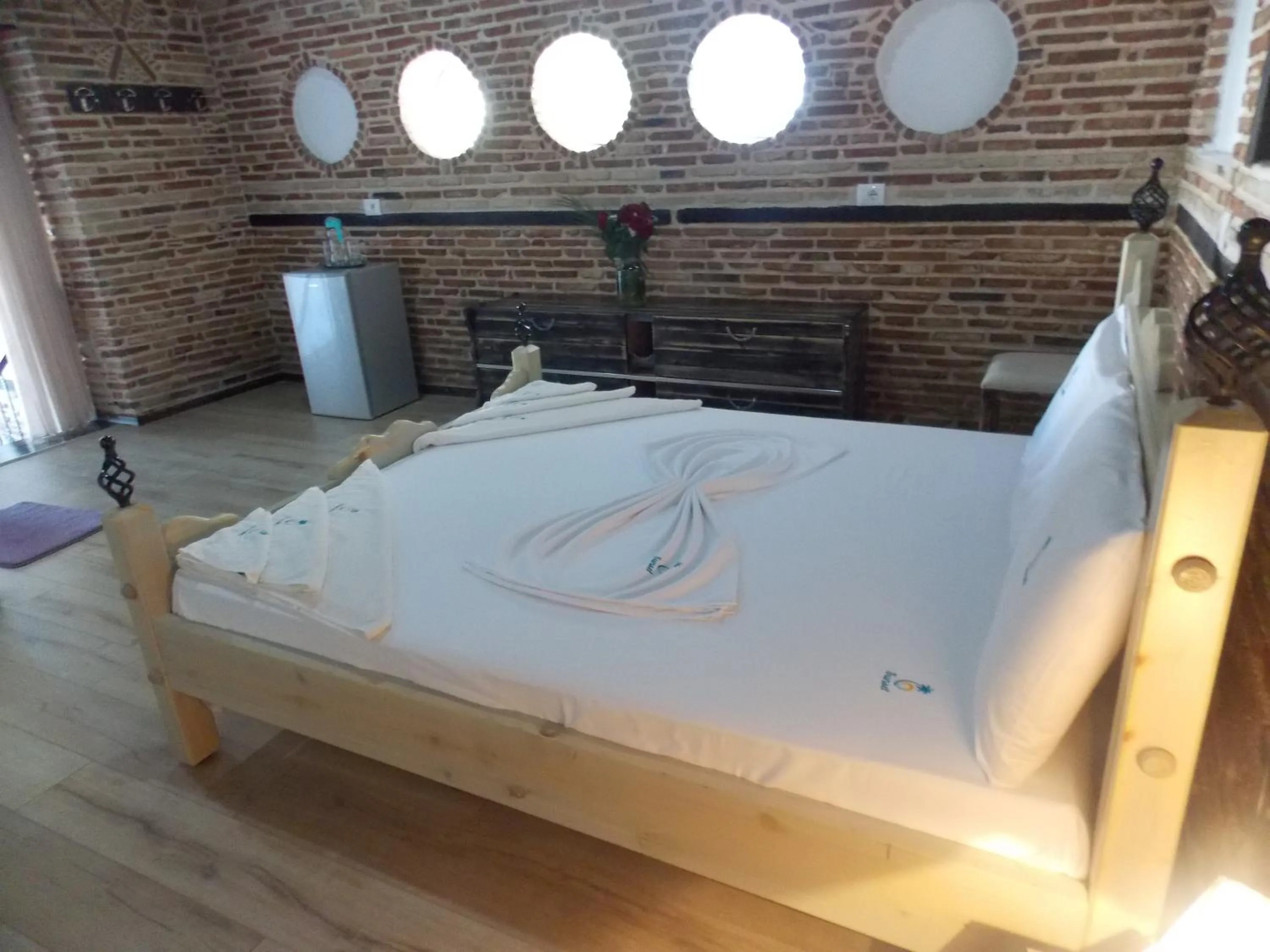 Bed in Sunset Suites