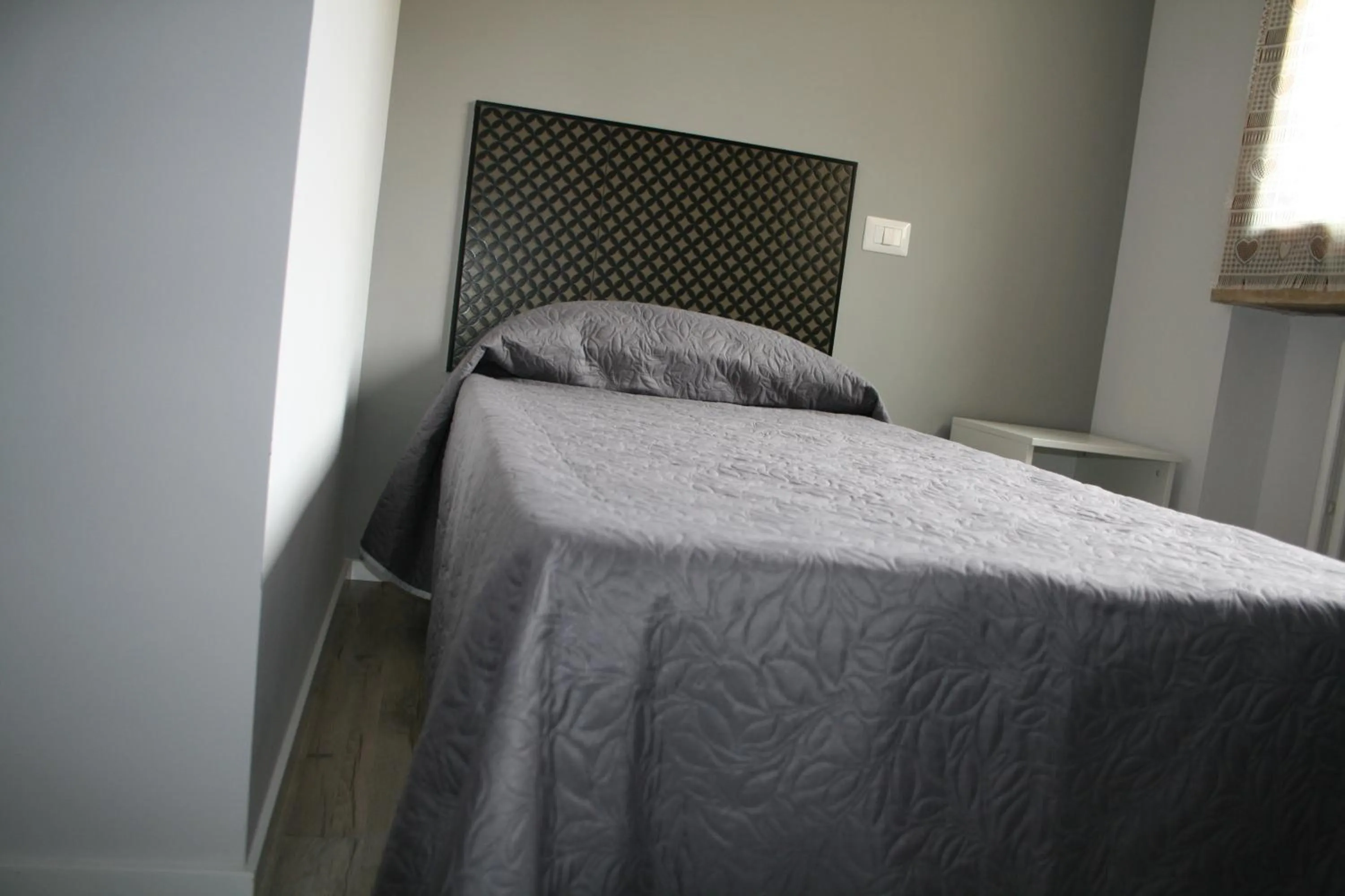 Bed in Affittacamere Umberto I