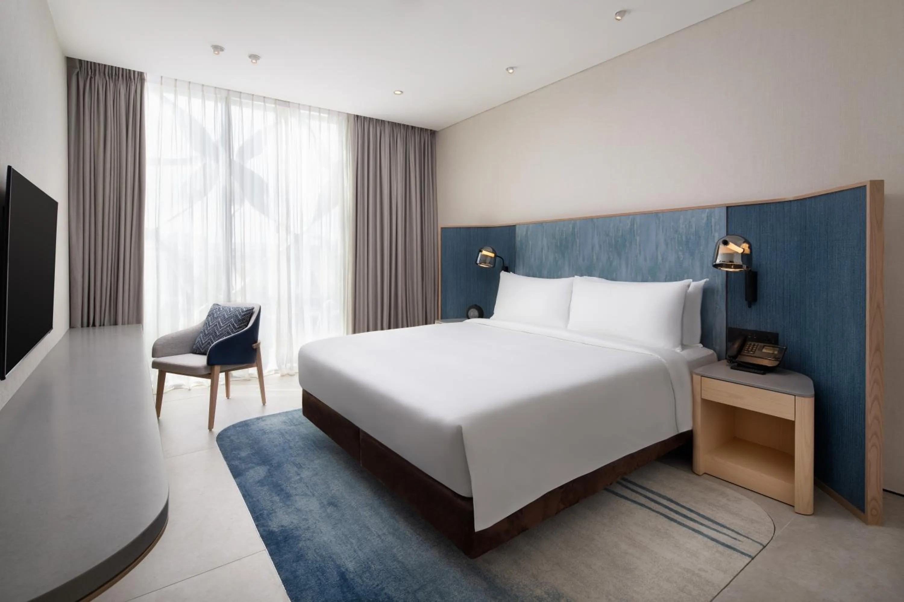 Bed in Crowne Plaza Changi Airport by IHG