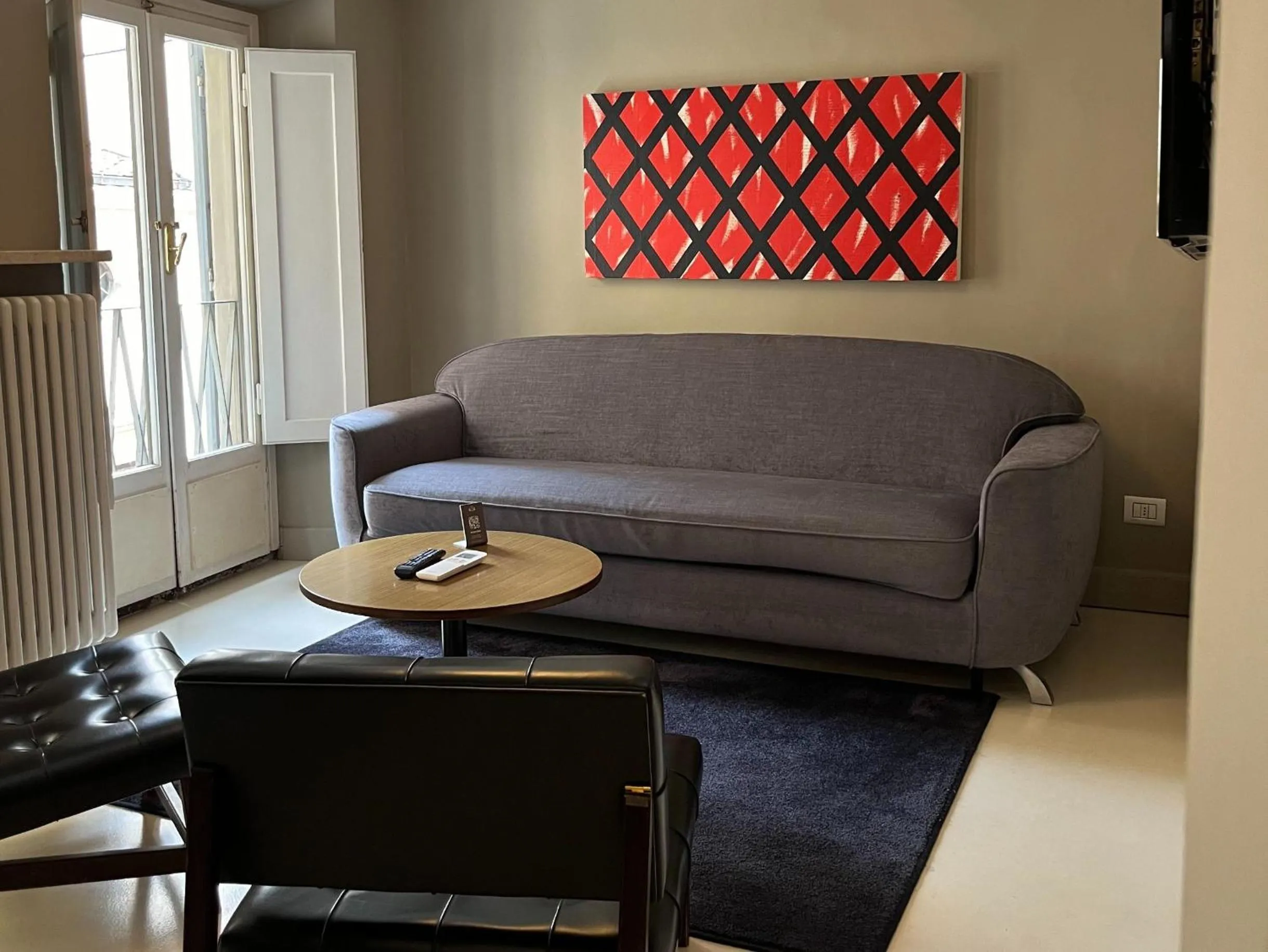 Living room in Numa Florence Palazzo San Niccolò