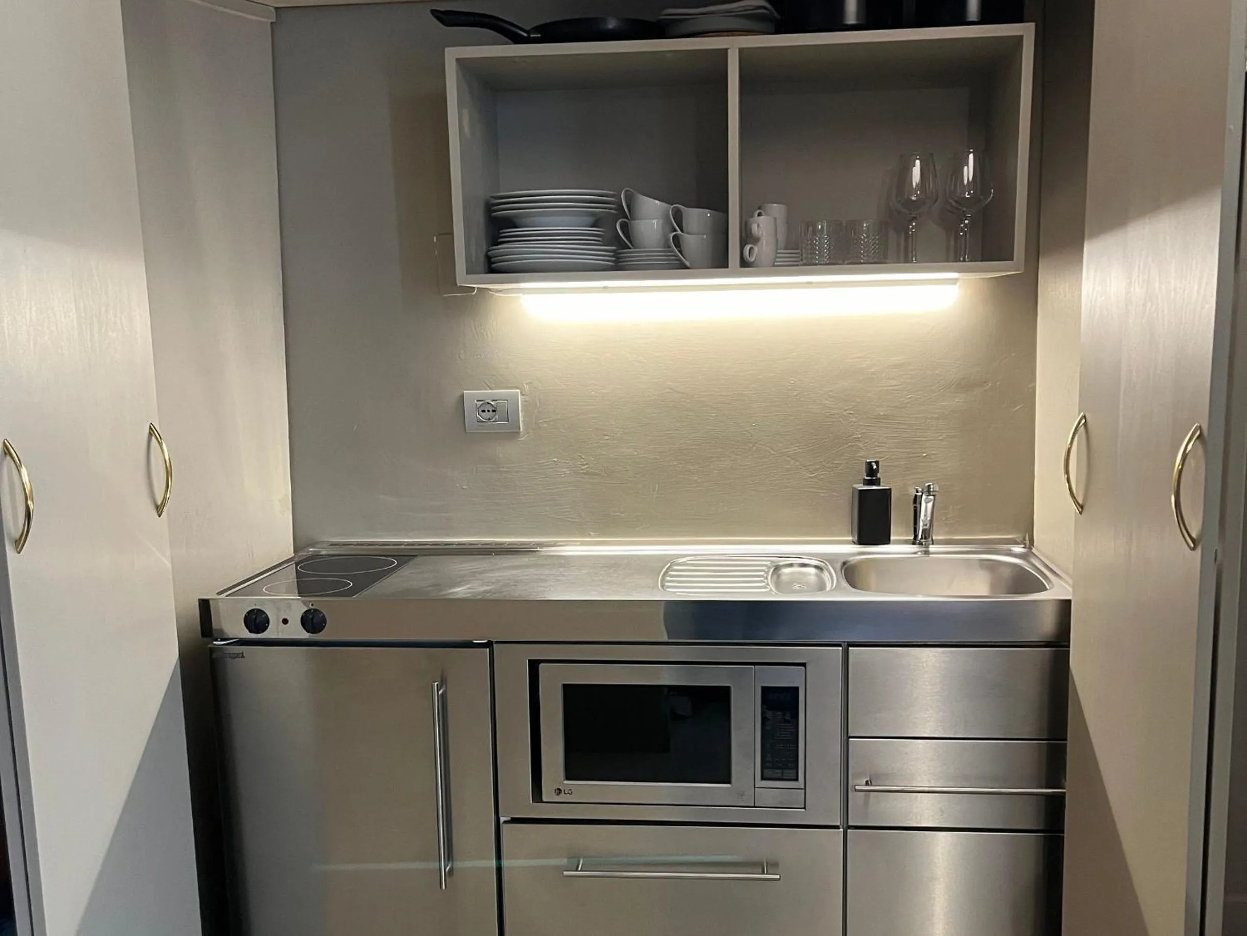 Kitchen or kitchenette in Numa Florence Palazzo San Niccolò