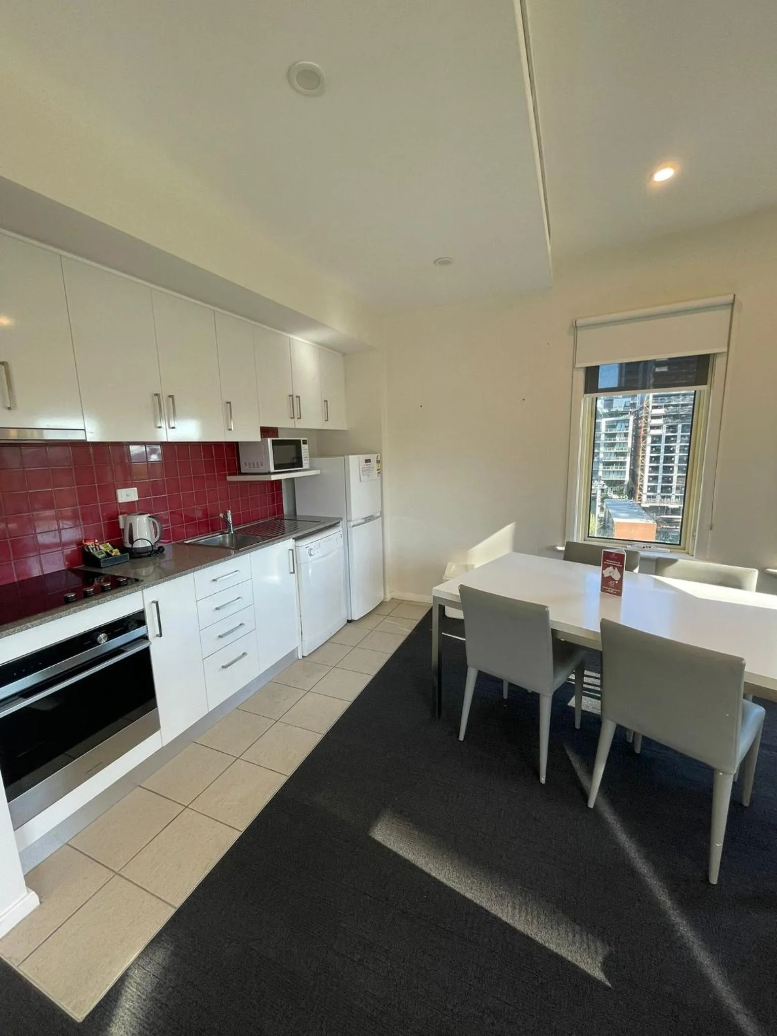 Kitchen or kitchenette in South Yarra Central Apartment Hotel