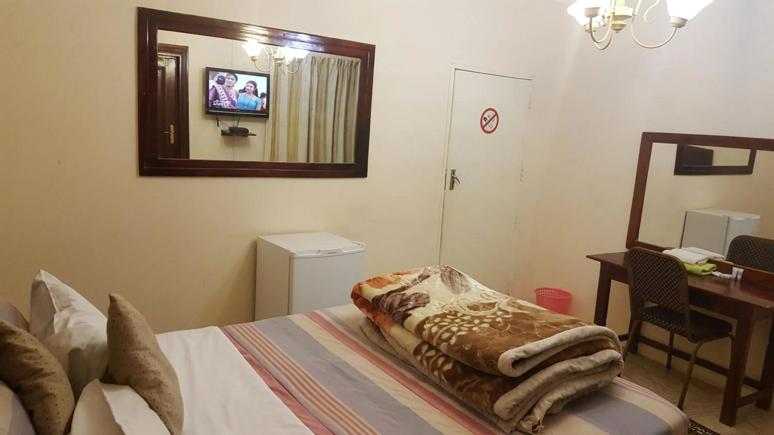 Bedroom in The Palace Guest House